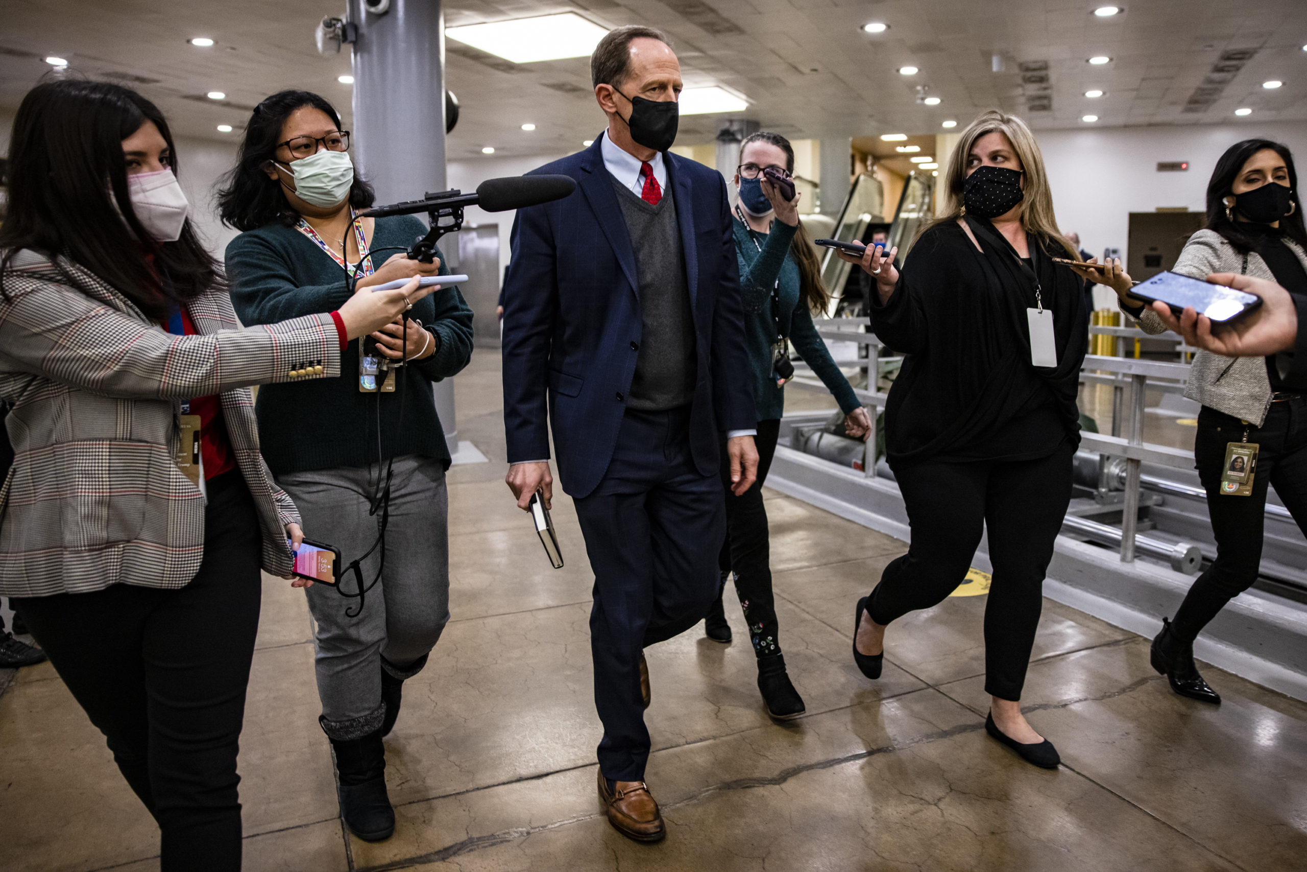 Republican Pennsylvania Sen. Pat Toomey walks through the Capitol in February. (Samuel Corum/Getty Images)