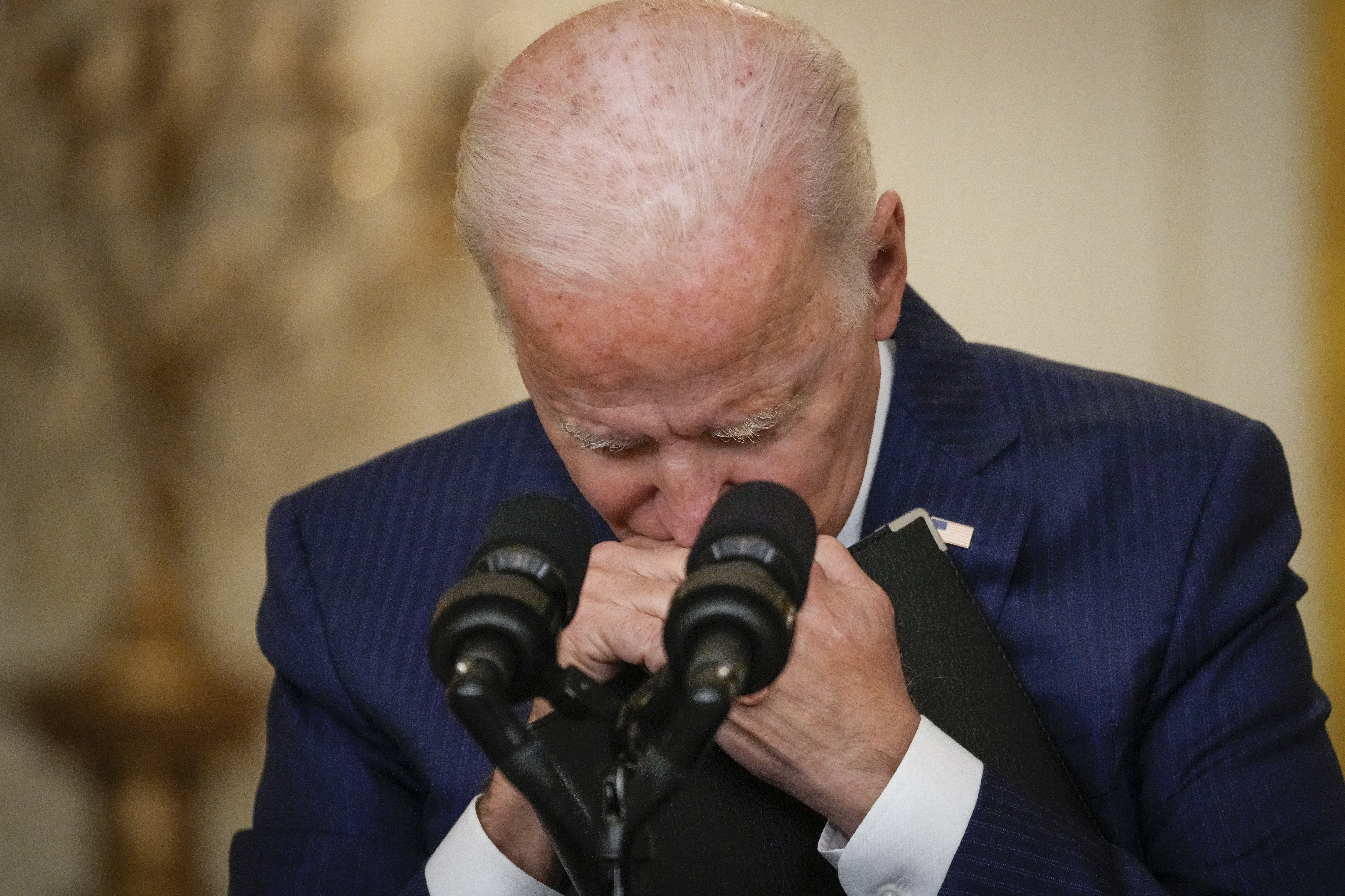 WASHINGTON, DC - AUGUST 26: U.S. President Joe Biden pauses while listening to a question from a reporter about the situation in Afghanistan in the East Room of the White House on August 26, 2021 in Washington, DC. (Drew Angerer/Getty Images)