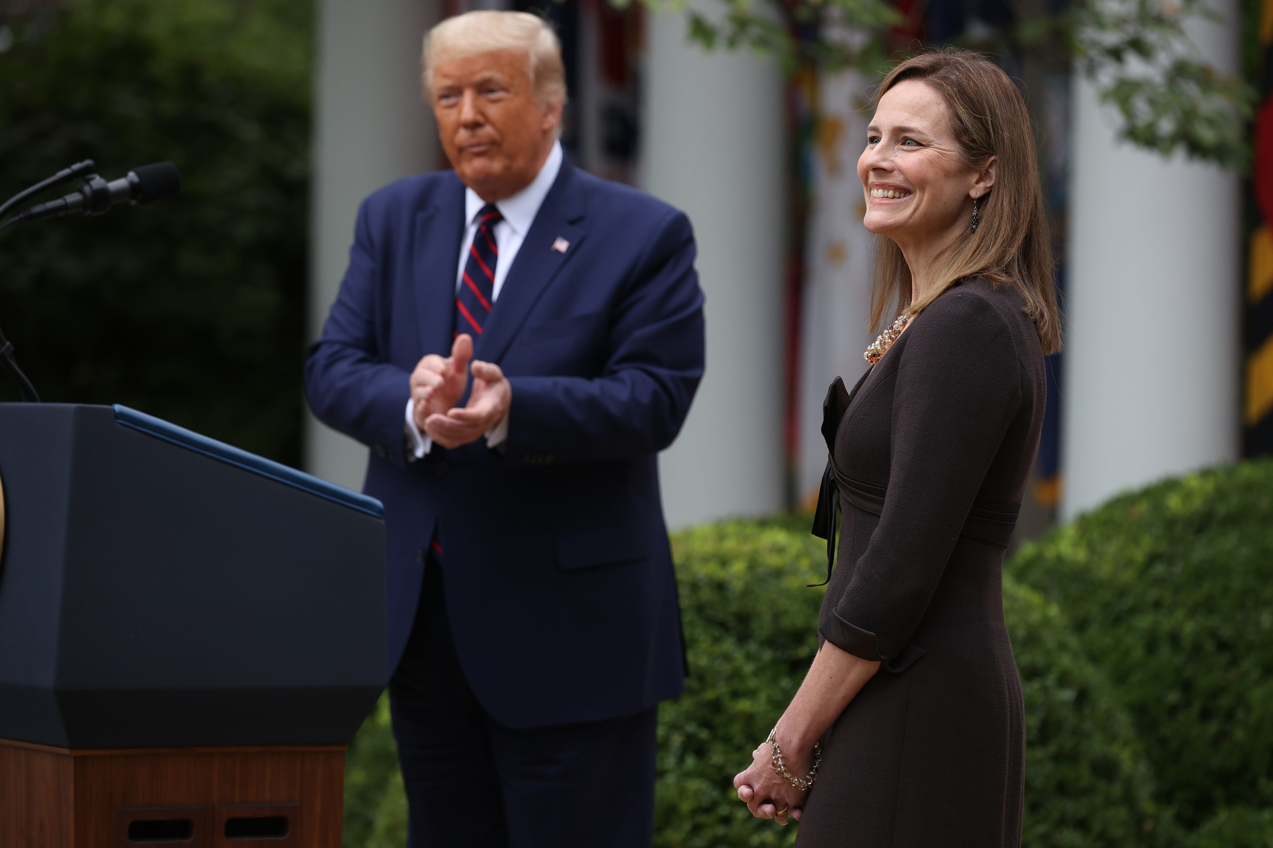 WASHINGTON, DC - SEPTEMBER 26: Seventh U.S. Circuit Court Judge Amy Coney Barrett smiles after U.S. President Donald Trump announced that she will be his nominee to the Supreme Court in the Rose Garden at the White House September 26, 2020 in Washington, DC. With 38 days until the election, Trump tapped Barrett to be his third Supreme Court nominee in just four years and to replace the late Associate Justice Ruth Bader Ginsburg, who will be buried at Arlington National Cemetery on Tuesday. (Photo by Chip Somodevilla/Getty Images)