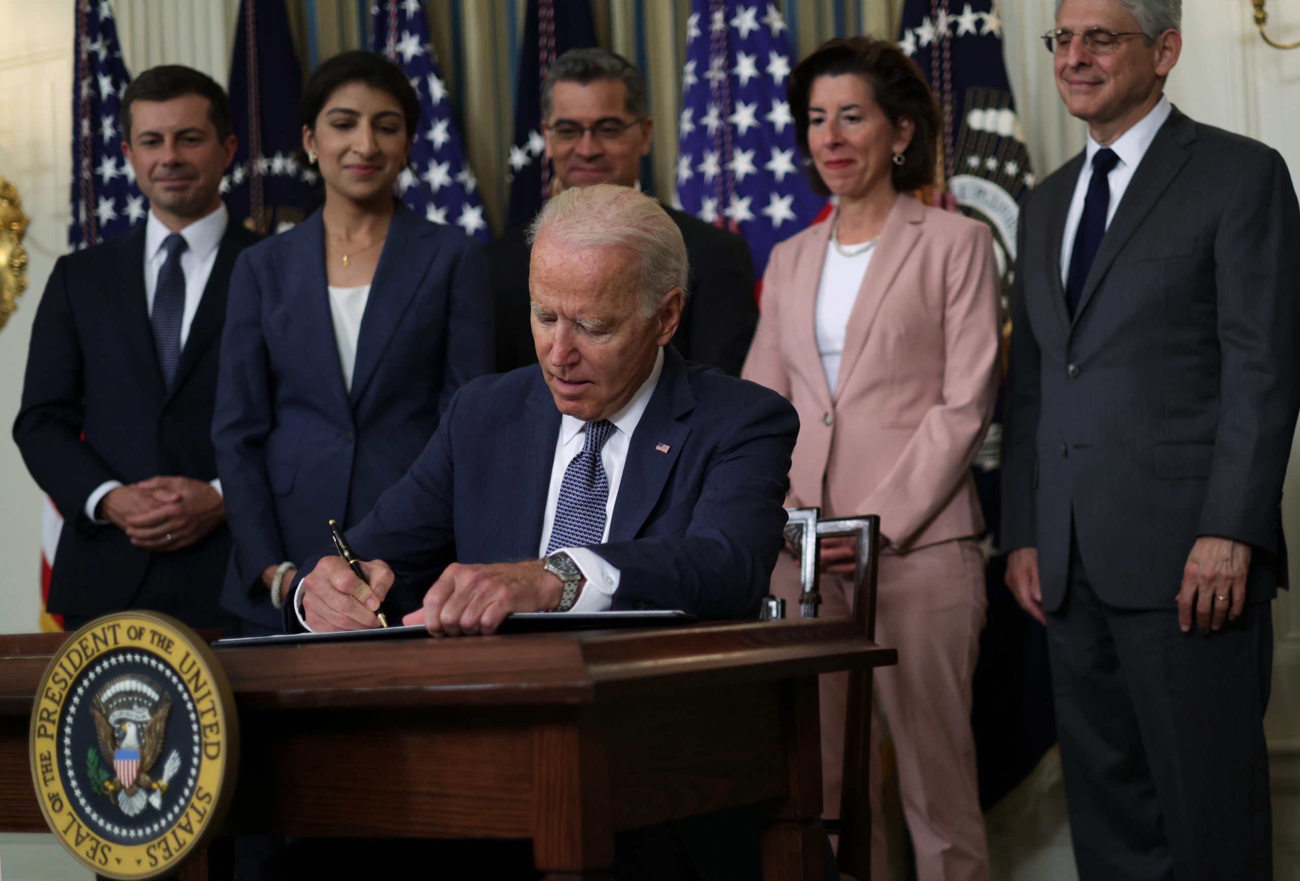 President Joe Biden signs a executive order on competition on July 9. (Alex Wong/Getty Images)