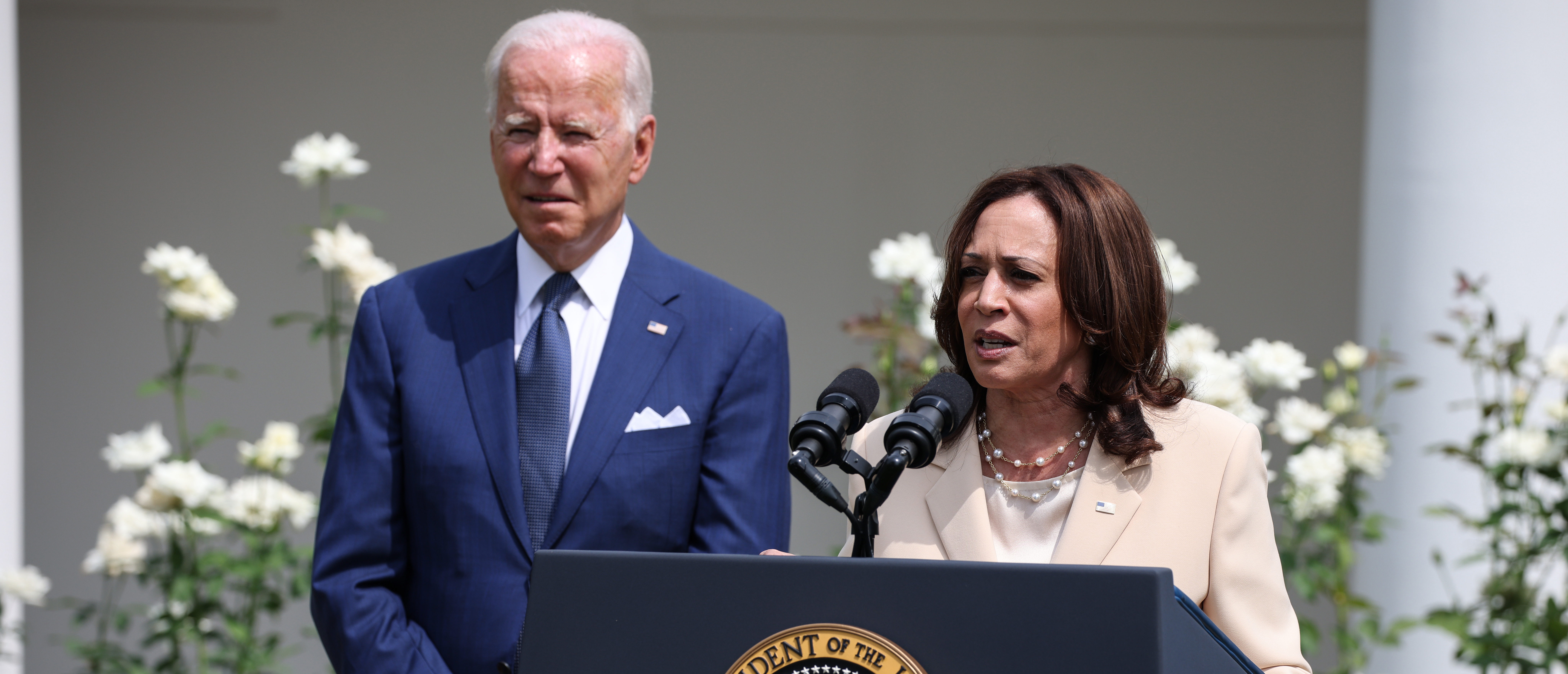 WASHINGTON, DC - JULY 26: U.S. Vice President Kamala Harris delivers remarks, as U.S. President Joe Biden looks on, in the Rose Garden of the White House on July 26, 2021 in Washington, DC. The event was to mark the 31st anniversary of the Americans with Disabilities Act (ADA) being signed into law. (Photo by Anna Moneymaker/Getty Images)