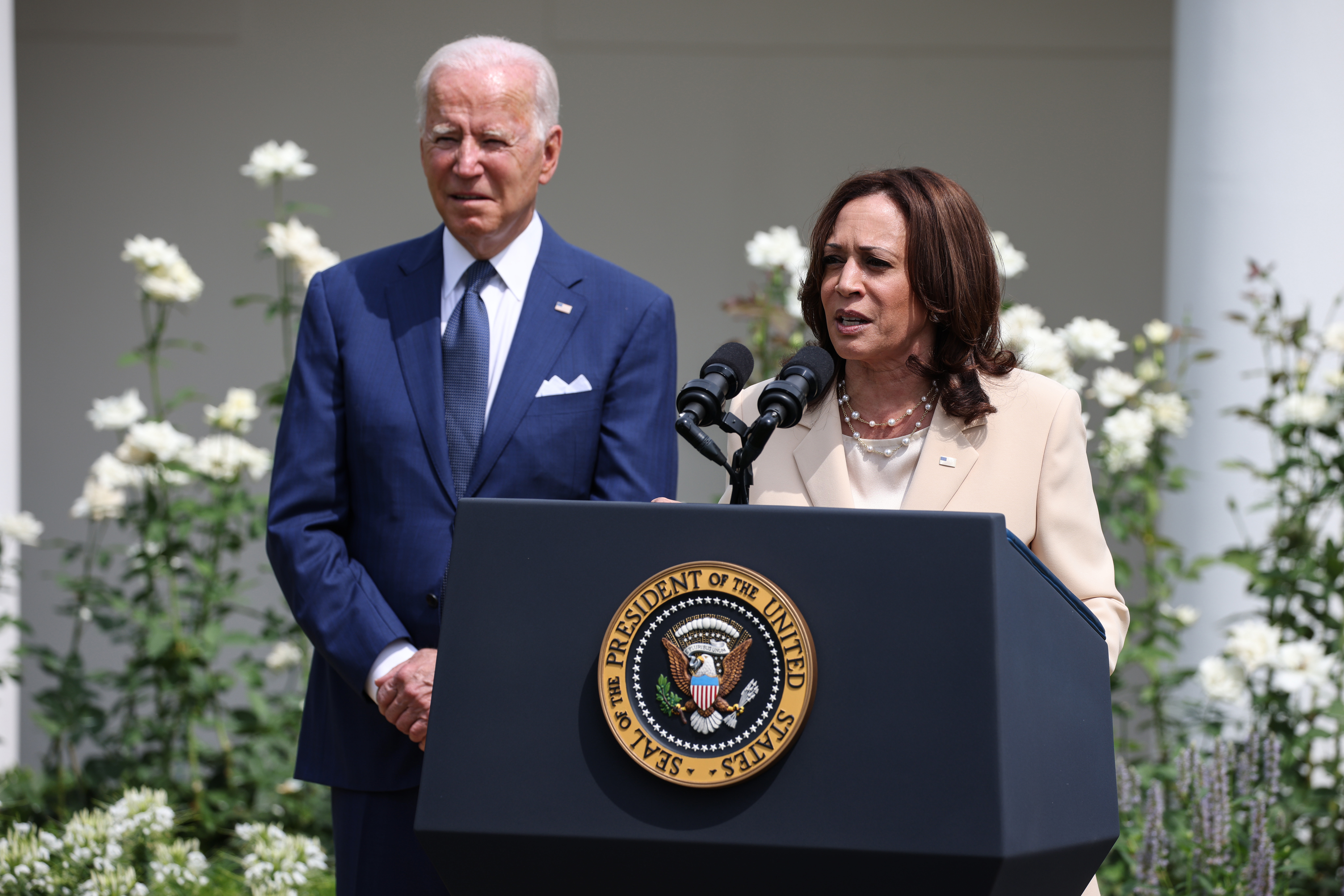 WASHINGTON, DC - JULY 26: U.S. Vice President Kamala Harris delivers remarks, as U.S. President Joe Biden looks on, in the Rose Garden of the White House on July 26, 2021 in Washington, DC. The event was to mark the 31st anniversary of the Americans with Disabilities Act (ADA) being signed into law. (Photo by Anna Moneymaker/Getty Images)