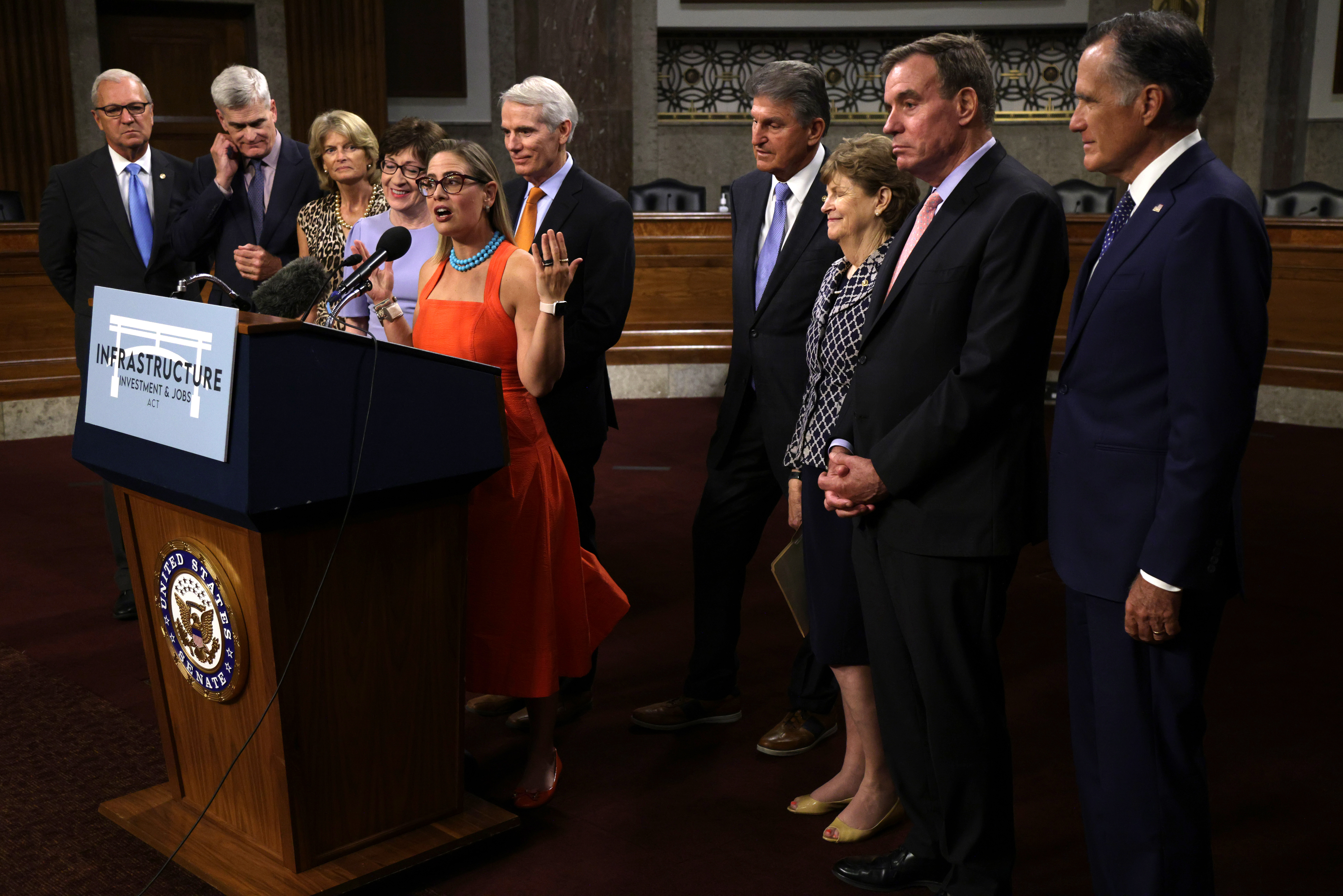 Sen. Kyrsten Sinema speaks about infrastructure during a news conference alongside bipartisan Senate colleagues on July 28. (Alex Wong/Getty Images)