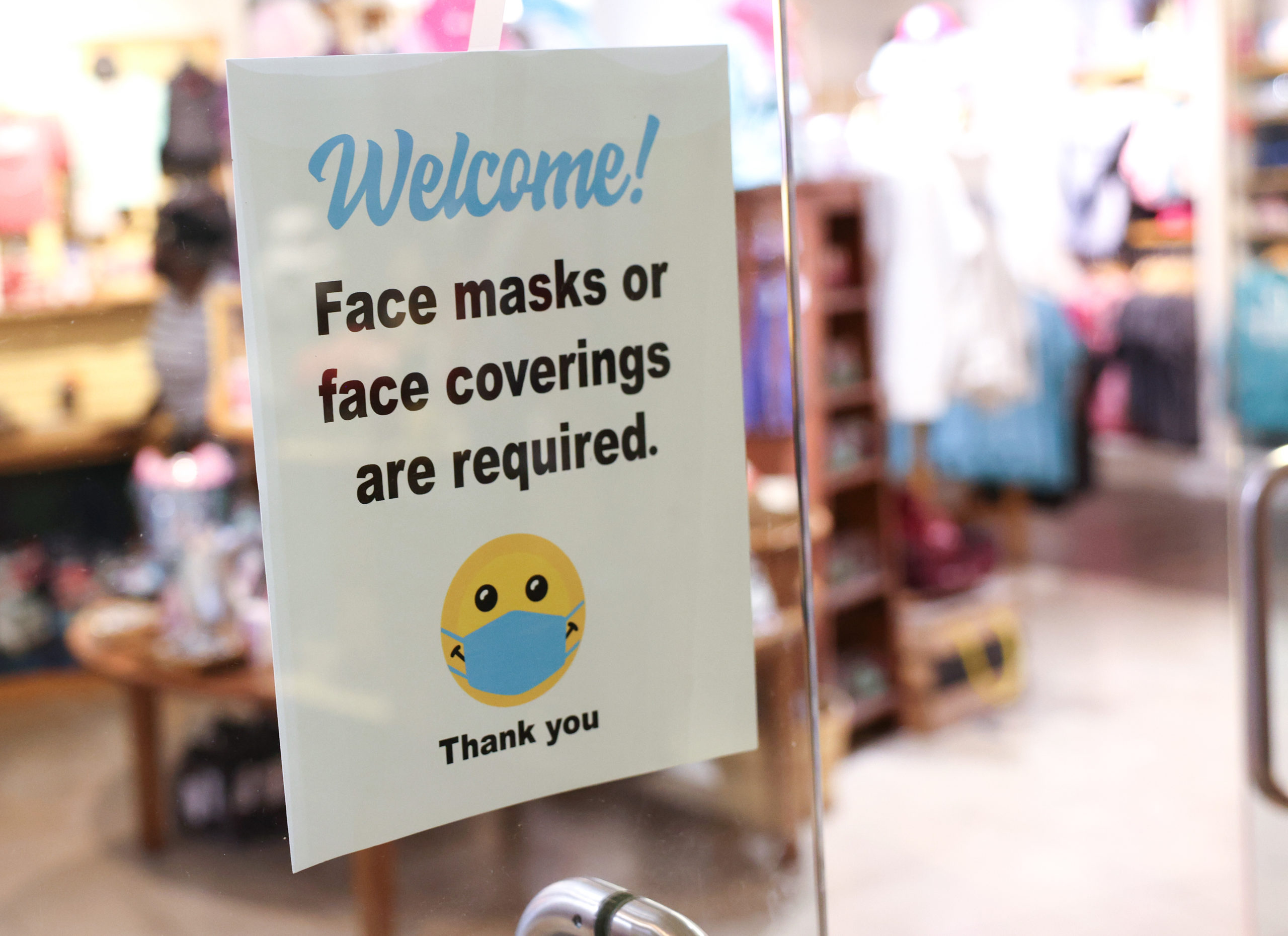 WASHINGTON, DC - JULY 30: A sign requiring mask use is seen outside of a store in Union Station on July 30, 2021 in Washington, DC. DC Mayor Muriel Bowser restored a COVID-19 indoor mask mandate, regardless of vaccination status, starting Saturday. (Photo by Kevin Dietsch/Getty Images)