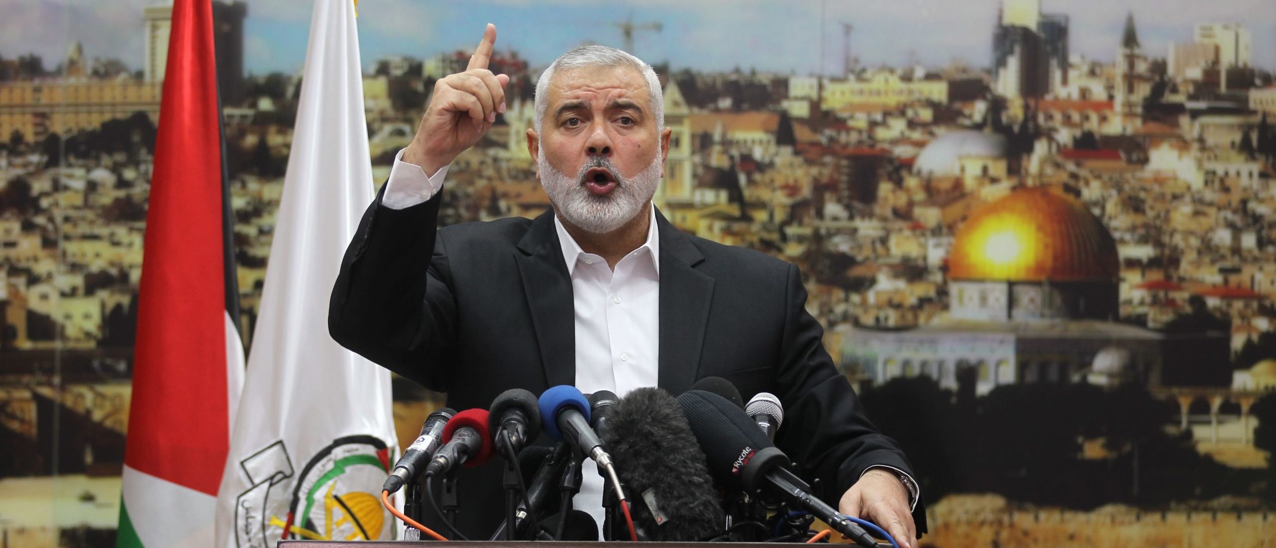 TOPSHOT - Hamas leader Ismail Haniya gestures as he delivers a speech over US President Donald Trump's decision to recognise Jerusalem as the capital of Israel, in Gaza City on December 7, 2017. Haniya called for a new Palestinian intifada, or uprising. This Zionist policy supported by the US cannot be confronted unless we ignite a new intifada," the head of the armed Palestinian Islamist movement that runs the Gaza Strip said in a speech. / AFP PHOTO / SAID KHATIB (Photo credit should read SAID KHATIB/AFP via Getty Images)