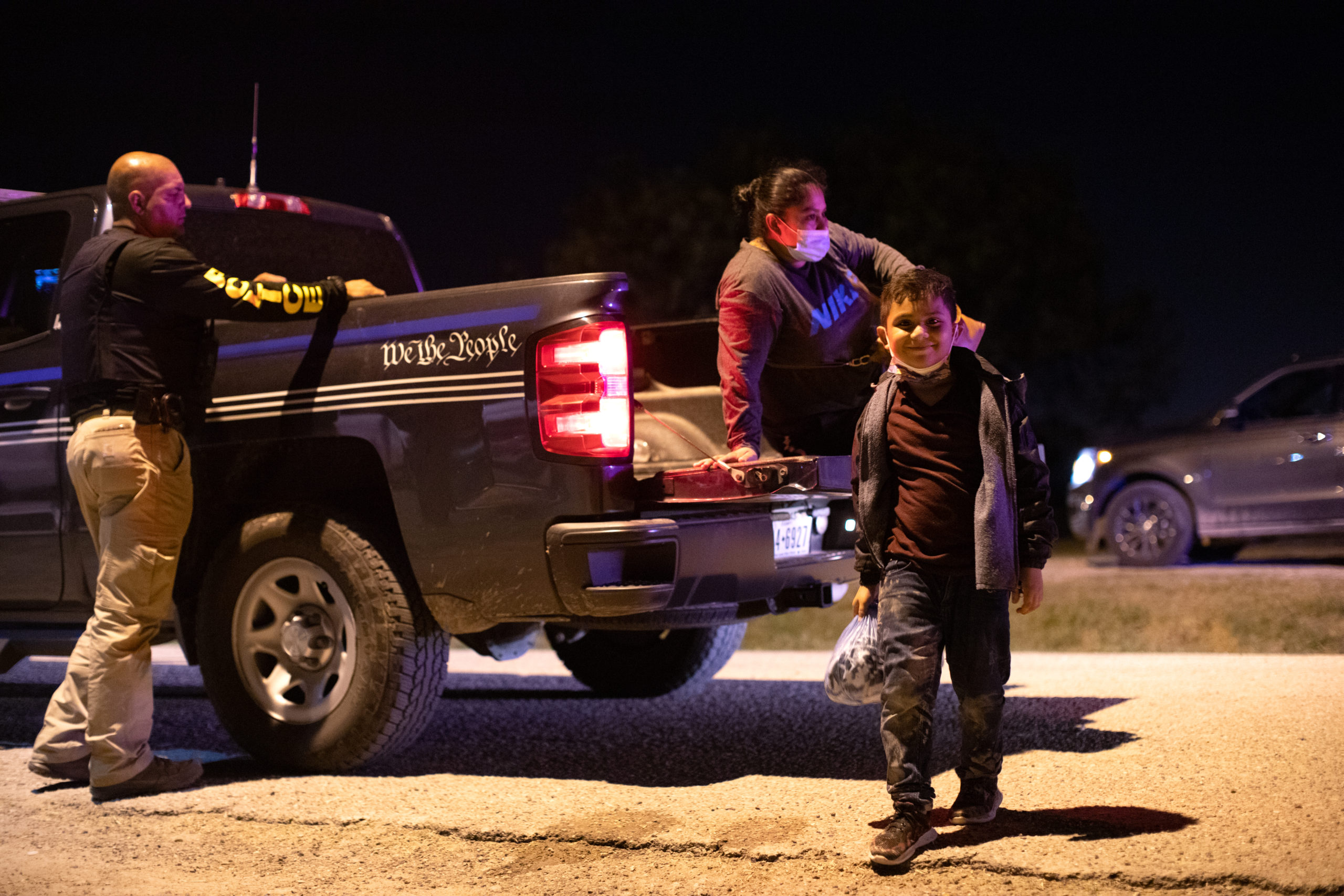Migrants turned themselves in to Customs and Border Protection officials to be processed in hopes of applying for asylum near La Joya, Texas, on August 7, 2021. (Kaylee Greenlee - Daily Caller News Foundation)