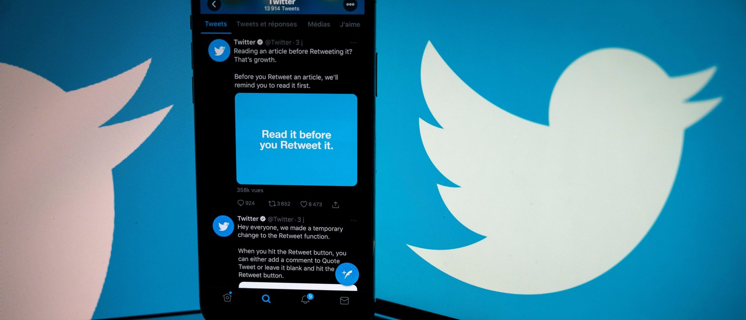 The logo of US social network Twitter displayed on the screen of a smartphone. (Photo by LIONEL BONAVENTURE/AFP via Getty Images)