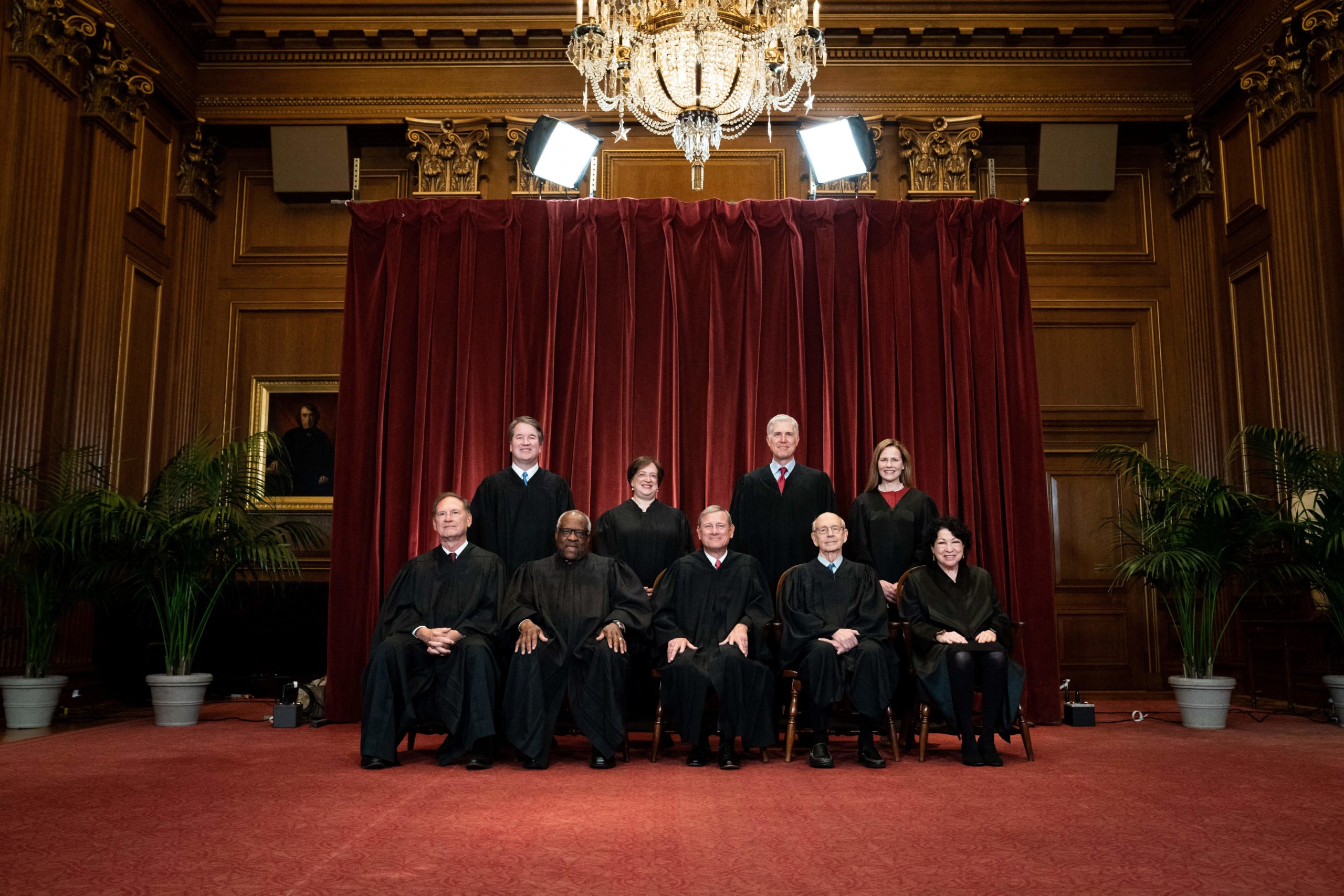Seated from left: Associate Justice Samuel Alito, Associate Justice Clarence Thomas, Chief Justice John Roberts, Associate Justice Stephen Breyer and Associate Justice Sonia Sotomayor, standing from left: Associate Justice Brett Kavanaugh, Associate Justice Elena Kagan, Associate Justice Neil Gorsuch and Associate Justice Amy Coney Barrett pose during a group photo of the Justices at the Supreme Court in Washington, DC on April 23, 2021. (Photo by ERIN SCHAFF/POOL/AFP via Getty Images)