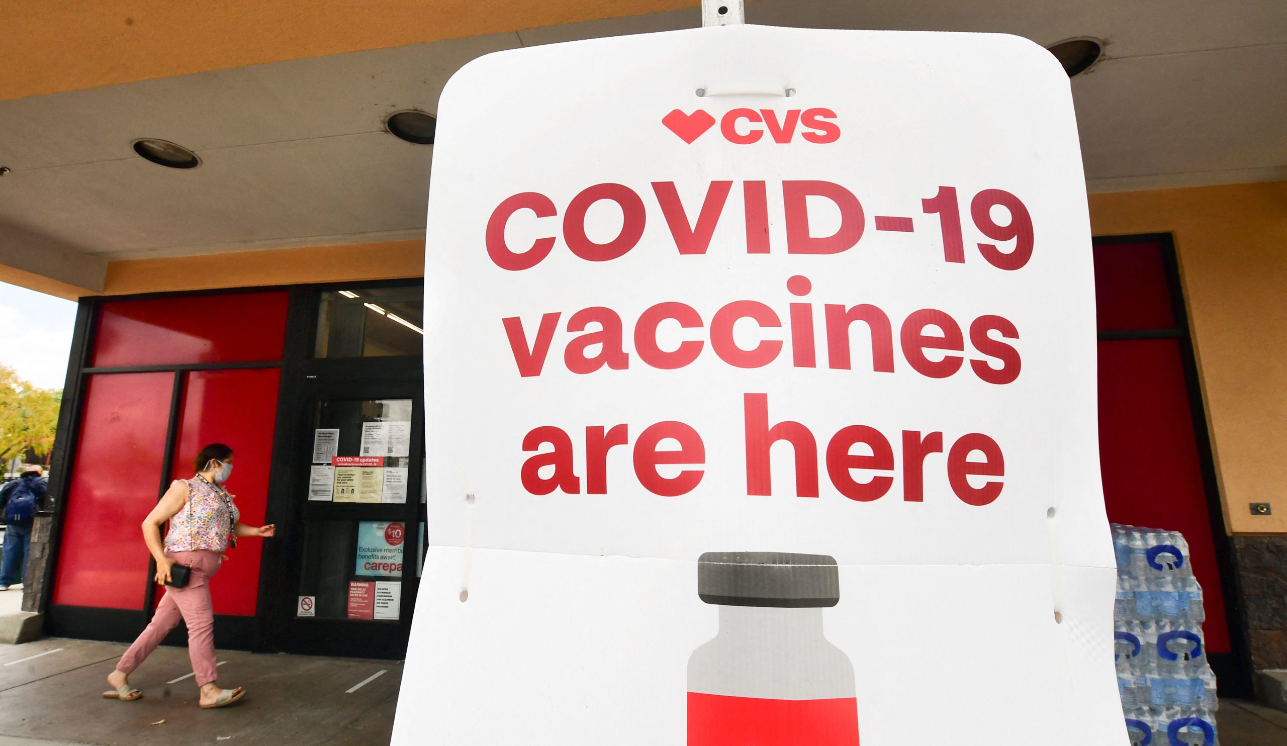 A woman enters a CVS COVID-19 vaccine site in Monterey Park, California on April 27. (Frederic J. Brown/AFP via Getty Images)