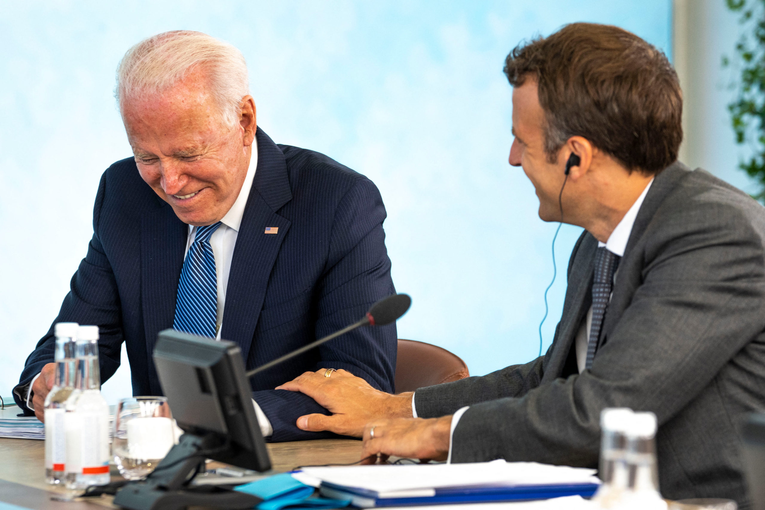 US President Joe Biden (L) talks with France's President Emmanuel Macron during a plenary session at the G7 summit in Carbis Bay, Cornwall on June 13, 2021. (Photo by Doug Mills / POOL / AFP) (Photo by DOUG MILLS/POOL/AFP via Getty Images)
