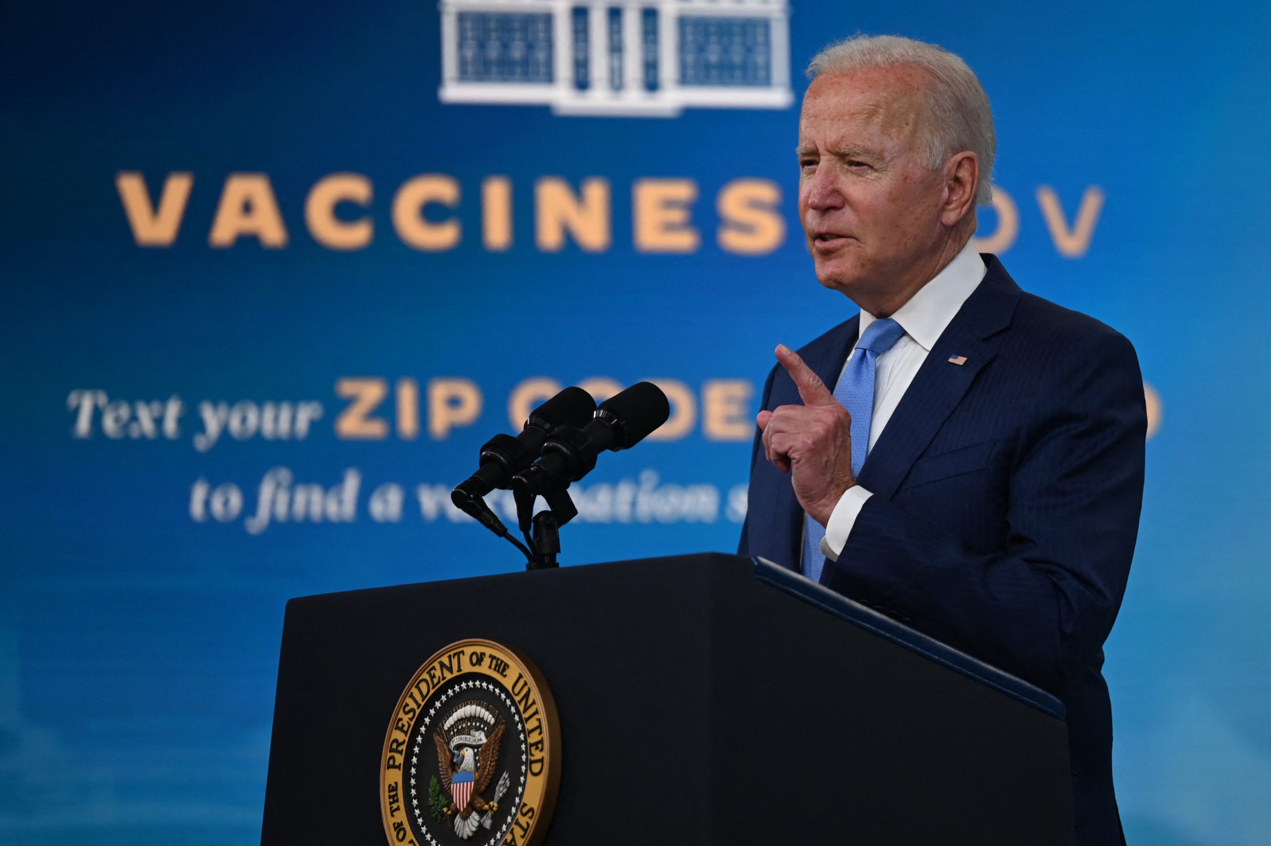 US President Joe Biden delivers remarks on the Covid-19 response and the vaccination program at the White House on August 23, 2021 in Washington,DC. - The US Food and Drug Administration on Monday fully approved the Pfizer-BioNTech Covid vaccine, a move that triggered a new wave of vaccine mandates as the Delta variant batters the country.Around 52 percent of the American population is fully vaccinated, but health authorities have hit a wall of vaccine hesitant people, impeding the national campaign. (Photo by Jim WATSON / AFP) (Photo by JIM WATSON/AFP via Getty Images)