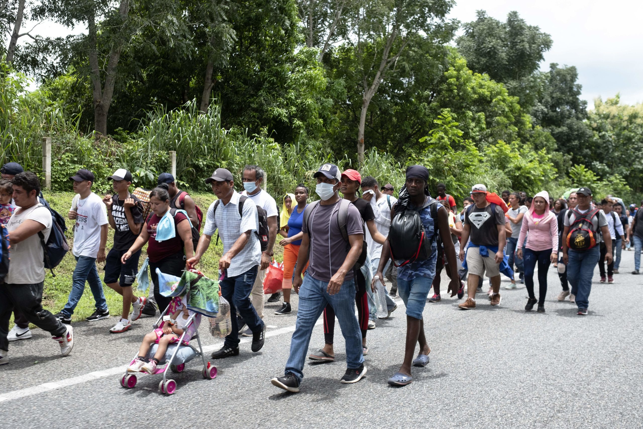 Central American and Haitian migrants are seen heading in a caravan to the US, in Tapachula, Chiapas State, Mexico, on September 4, 2021. (Photo by JACKY MUNIELLO/AFP via Getty Images)