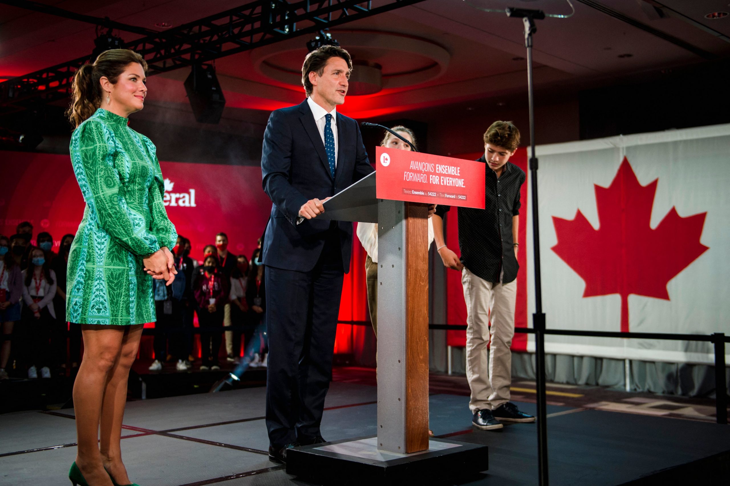 Canadian Prime Minister Justin Trudeau, flanked by wife Sophie Gregoire-Trudeau and children Ella-Grace and Xavier, delivers his victory speech after general elections at the Fairmount Queen Elizabeth Hotel in Montreal, Quebec, early on September 21, 2021. - Canadians returned Liberal Prime Minister Justin Trudeau to power on September 20 in hotly contested elections against a rookie conservative leader, but he failed to gain an absolute majority, according to projections by television networks. (Photo by ANDREJ IVANOV/AFP via Getty Images)