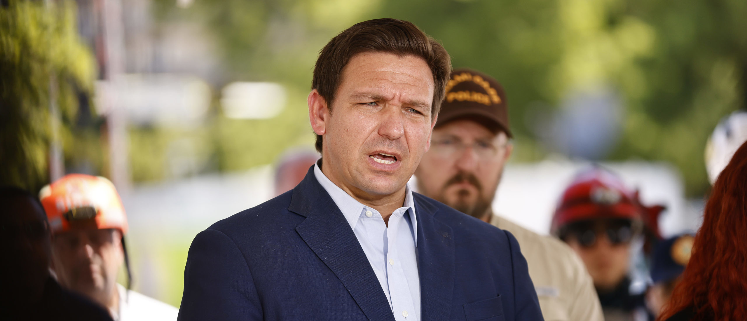 Florida Gov. Ron DeSantis speaks to the media about the 12-story Champlain Towers South condo building that partially collapsed on July 03, 2021 in Surfside, Florida. Over one hundred people are being reported as missing as the search-and-rescue effort continues. (Photo by Michael Reaves/Getty Images)