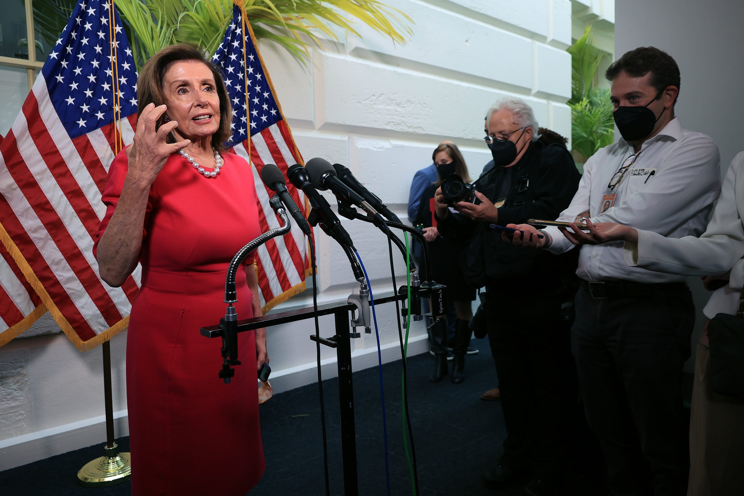 House Speaker Nancy Pelosi talks to reporters following a House Democratic caucus meeting Tuesday. (Chip Somodevilla/Getty Images)