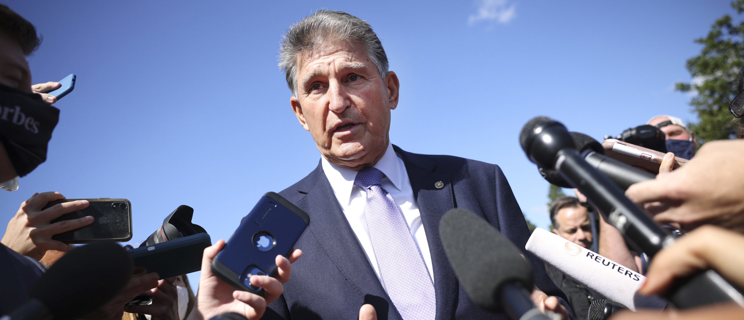 WASHINGTON, DC - SEPTEMBER 30: Sen. Joe Manchin (D-WV) speaks to reporters outside of the U.S. Capitol on September 30, 2021 in Washington, DC. The Senate is expected to pass a short term spending bill to avoid a government shutdown. (Photo by Kevin Dietsch/Getty Images)
