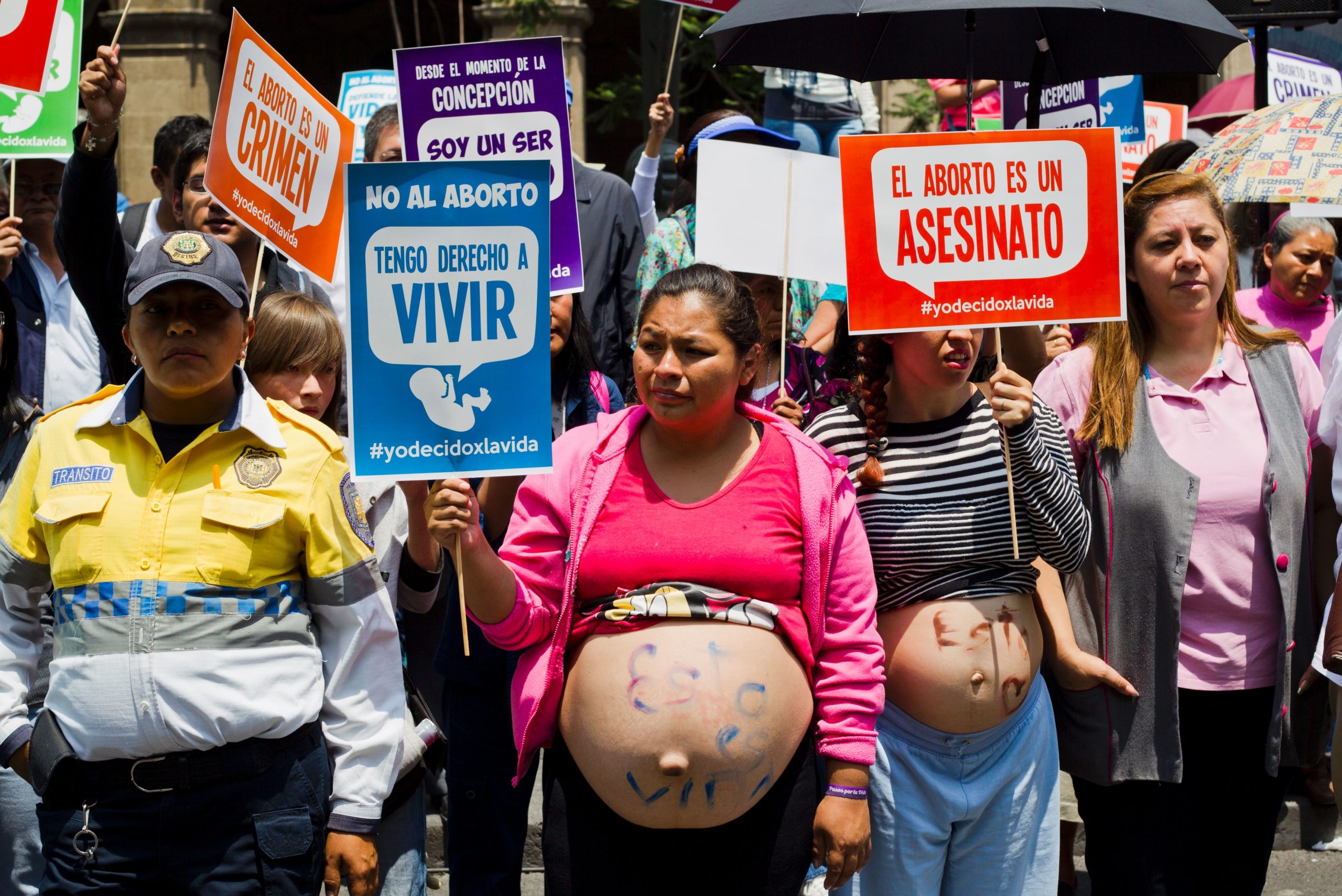 Catholic anti-abortion activists protest as the Supreme Court debates on whether to declare unconstitutional certain points of an abortion law which would open a loophole for its gradual decriminalization across the country, in front of the Supreme Court in Mexico City on June 29, 2016. (Photo credit should read HECTOR GUERRERO/AFP via Getty Images)
