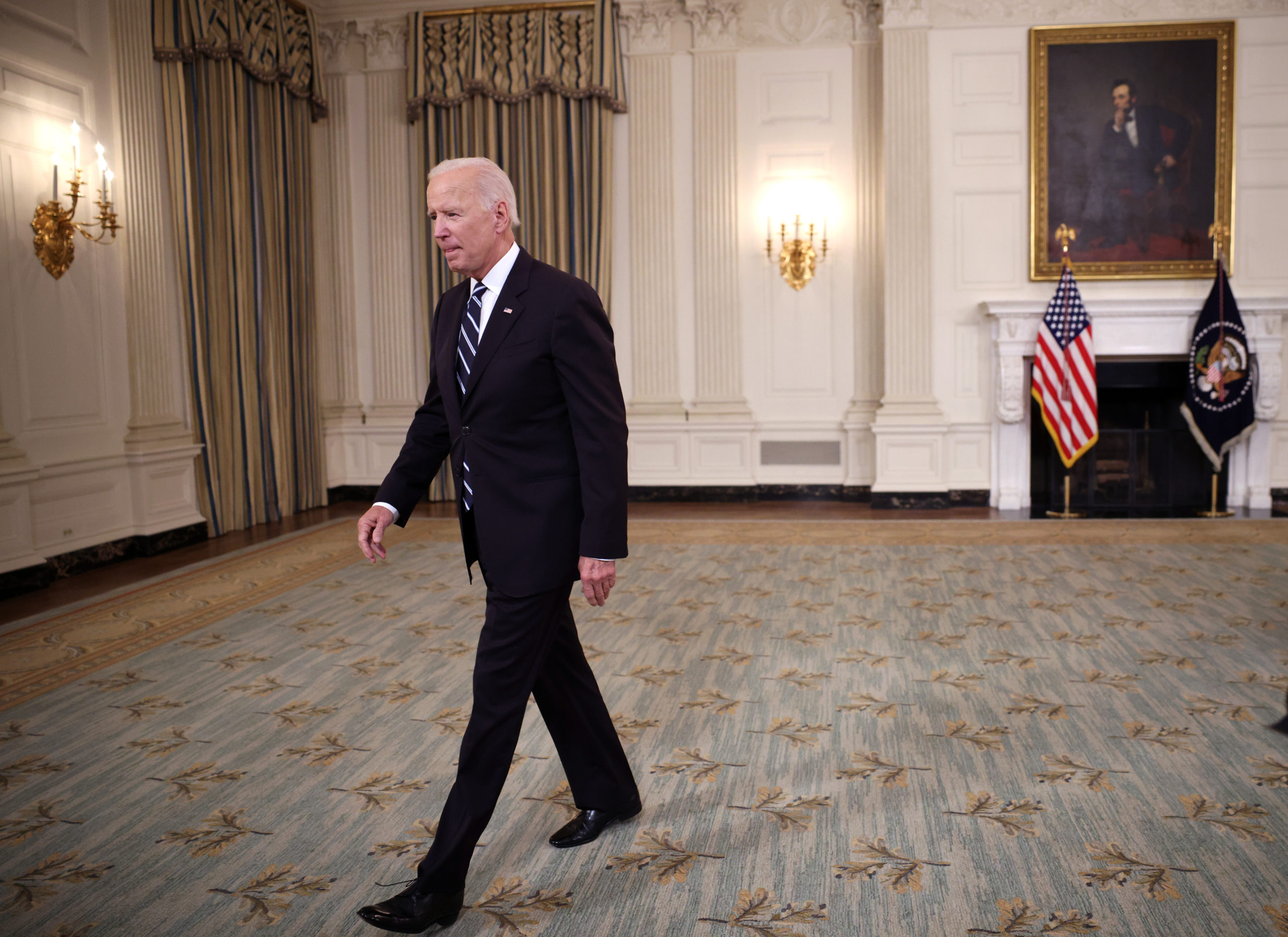 WASHINGTON, DC - SEPTEMBER 09: U.S. President Joe Biden leaves after speaking about combatting the coronavirus pandemic in the State Dining Room of the White House on September 9, 2021 in Washington, DC. As the Delta variant continues to spread around the United States, Biden outlined his administration's six point plan, including a requirement that all federal workers to be vaccinated against Covid-19. Biden is also instructing the Department of Labor to draft a rule mandating that all businesses with 100 or more employees require their workers to get vaccinated or face weekly testing. on September 09, 2021 in Washington, DC. (Photo by Kevin Dietsch/Getty Images)