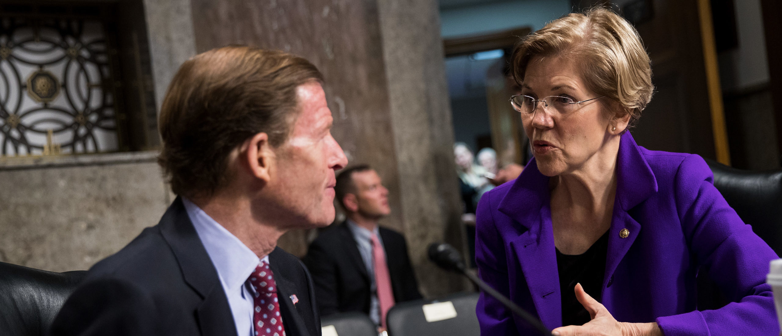 Sen. Richard Blumenthal talks with Sen. Elizabeth Warren (D-MA) before the start of a Senate Armed Services Committee hearing concerning the roles and responsibilities for defending the nation against cyber attacks, on Capitol Hill, October 19, 2017 in Washington, DC. (Photo by Drew Angerer/Getty Images)