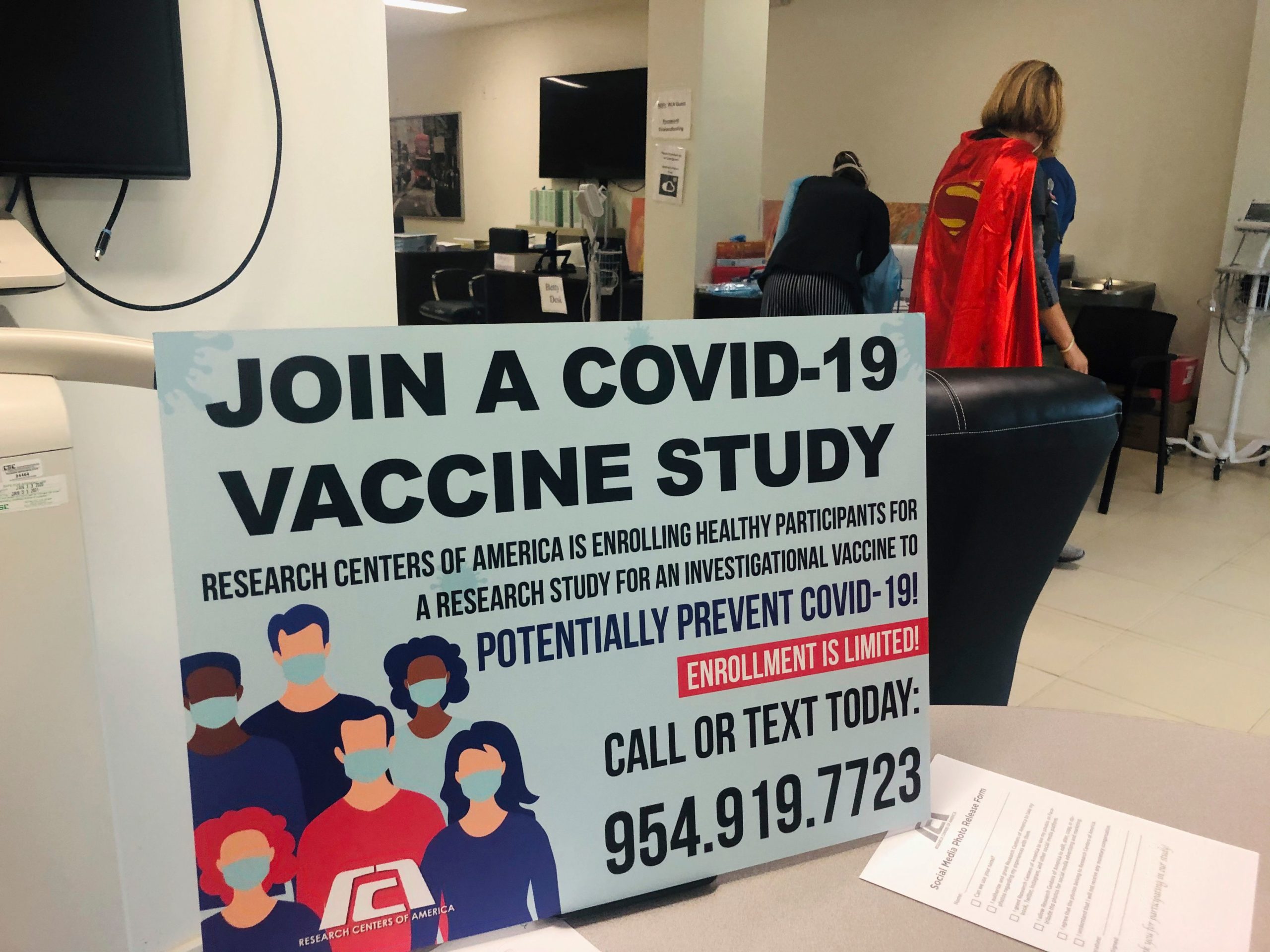 A sign is seen at the Research Centers of America, on August 18, 2020 during the phase 3 Covid-19 trial of the Moderna vaccine in Hollywood, Florida. (Photo by LEILA MACOR/AFP via Getty Images)