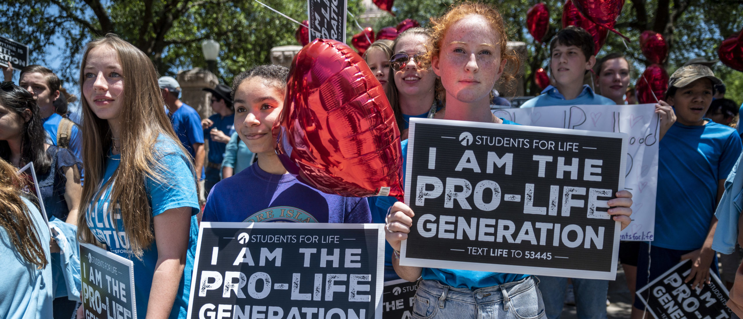 Pro-life protesters stand near the gate of the Texas state capitol at a protest outside the Texas state capitol on May 29, 2021 in Austin, Texas. (Photo by Sergio Flores/Getty Images)