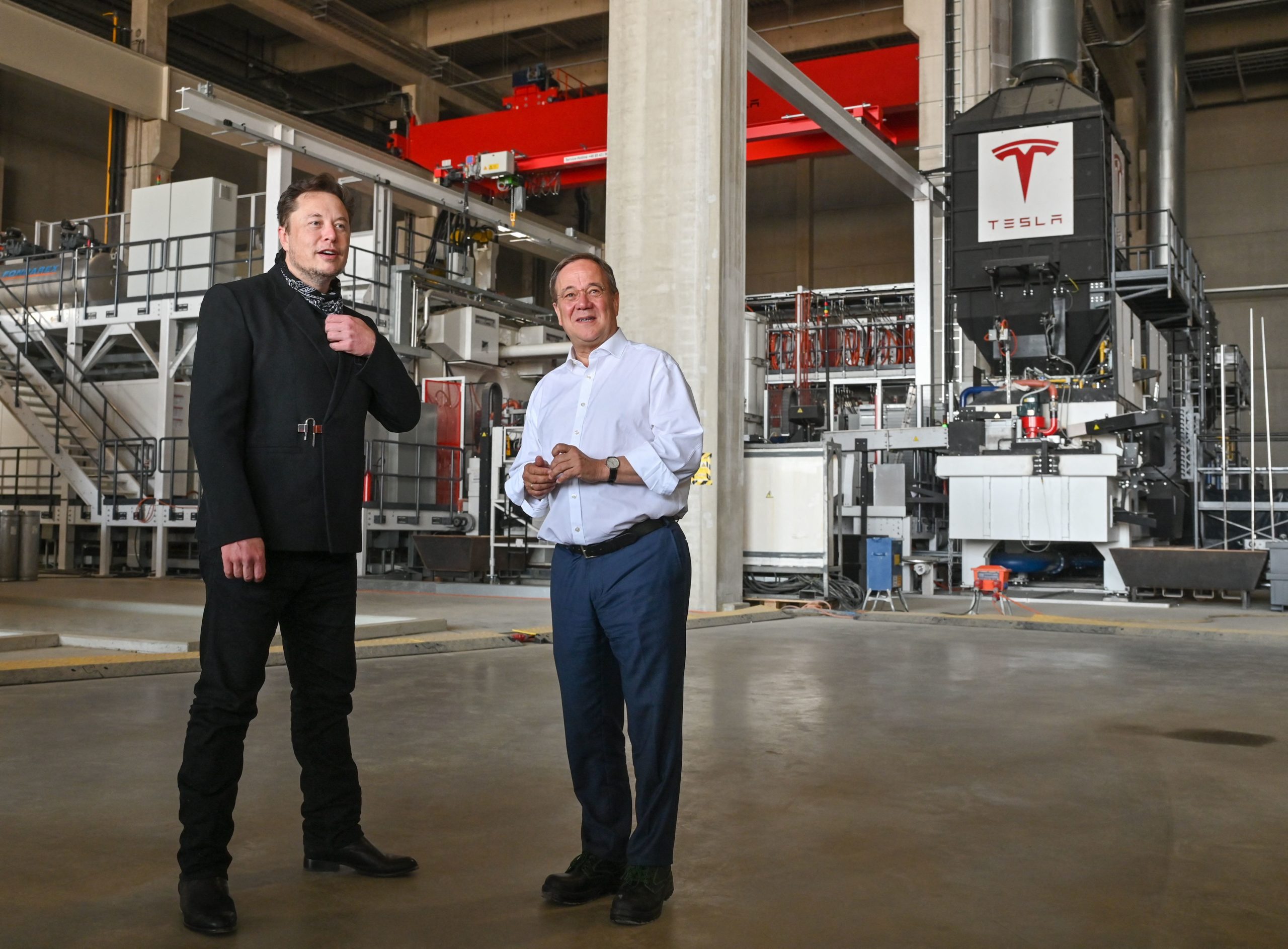 Elon Musk visits a Tesla Gigafactory plant under construction in Germany on Aug. 13. (Patrick Pleul/Pool/AFP via Getty Images)