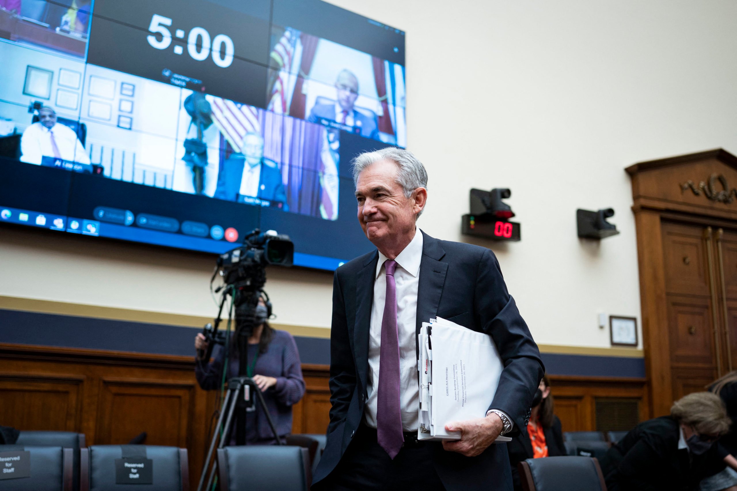 Federal Reserve Chairman Jerome Powell departs after speaking at a hearing Thursday. (Al Drago/Pool/AFP via Getty Images)