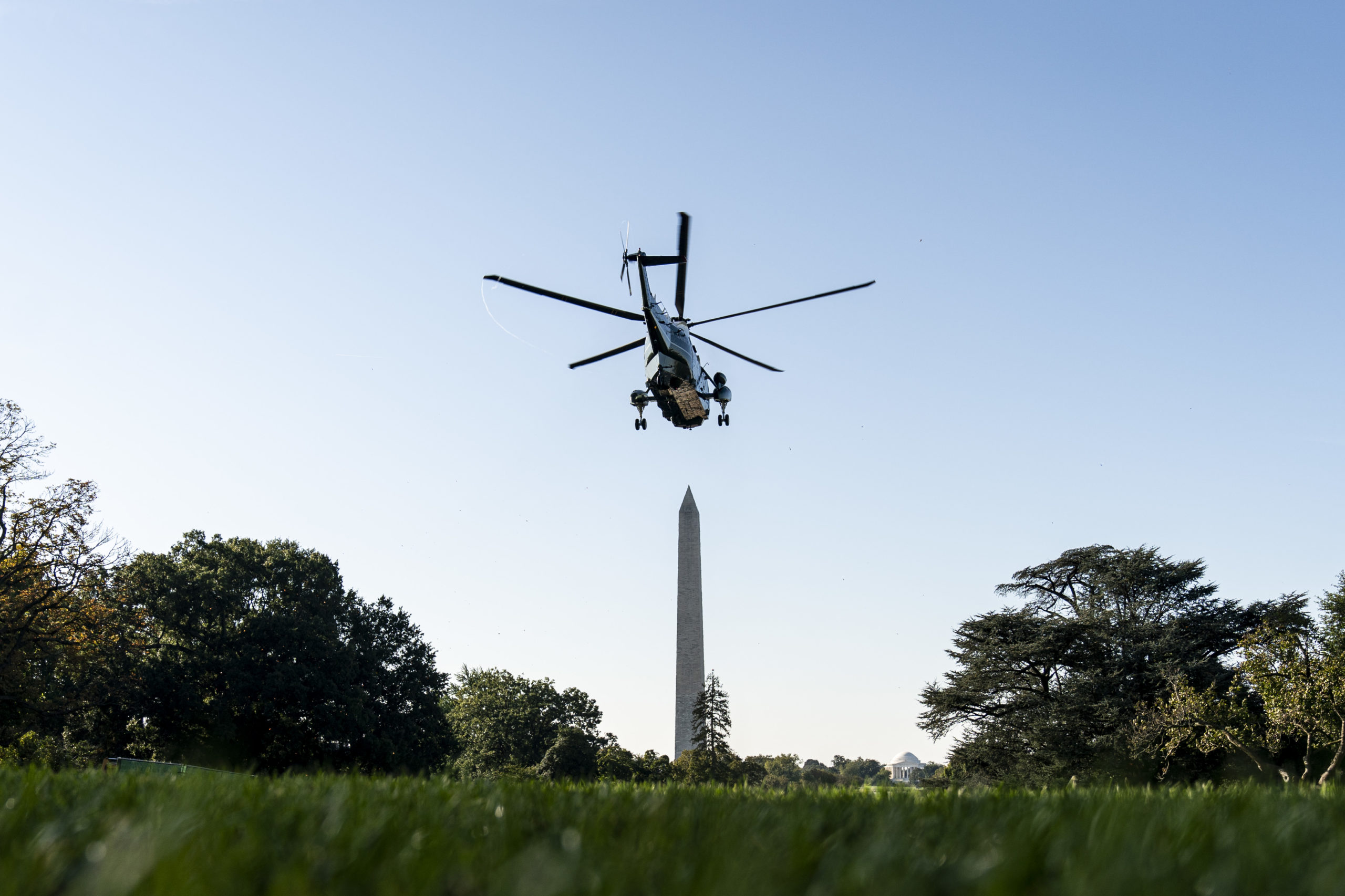 WASHINGTON, DC - OCTOBER 2: Marine One carries U.S. President Joe Biden as he departs for Wilmington, Delaware, from the White House on October 2, 2021 in Washington, DC. Biden has put on hold his $1 trillion infrastructure bill telling Congressional Democrats that his climate change and social spending bill must be passed first. (Photo by Joshua Roberts/Getty Images)