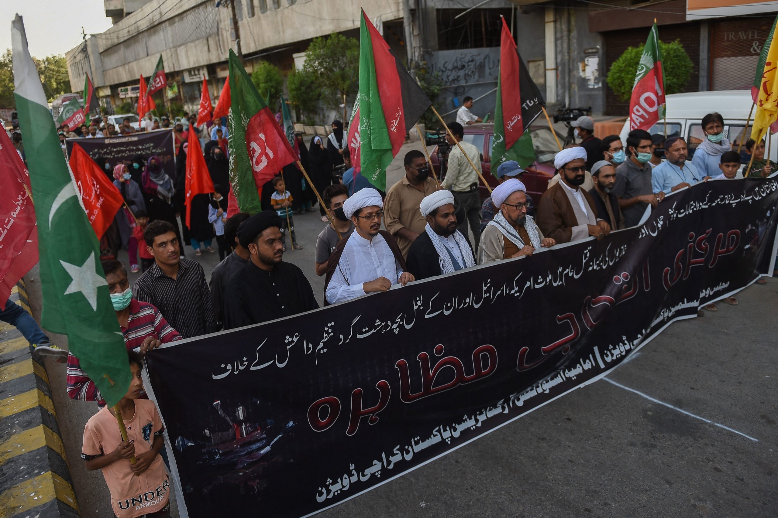Pakistani Shiite Muslims stage a demonstration in Karachi on October 17, 2021 to protest against a suicide bomb attack that took place earlier at a Shiite mosque during Friday prayers in Kandahar, Afghanistan. (Photo by RIZWAN TABASSUM/AFP via Getty Images)