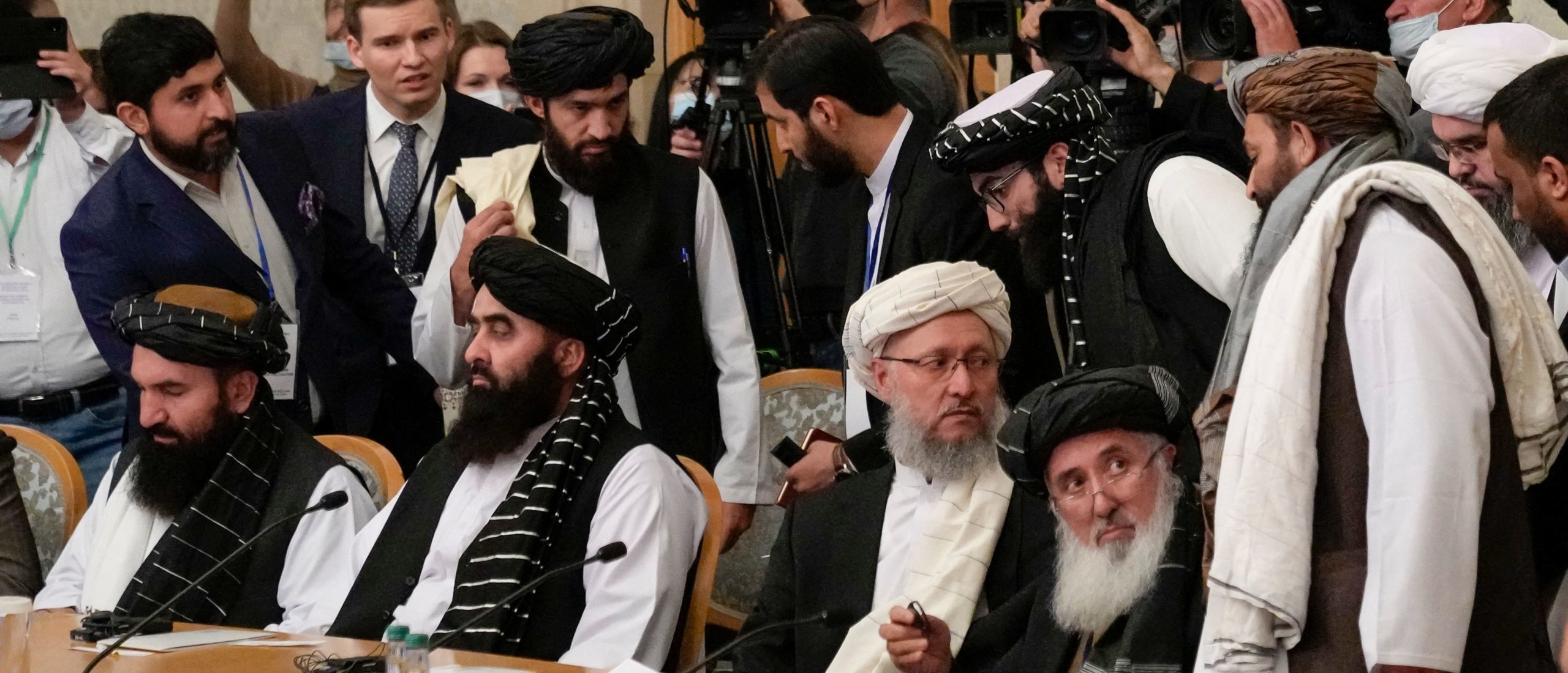 Members of the Taliban delegation, icluding deputy prime minister Abdul Salam Hanafi (C), attend an international conference on Afghanistan in Moscow on October 20, 2021. (Photo by Alexander Zemlianichenko / POOL / AFP) (Photo by ALEXANDER ZEMLIANICHENKO/POOL/AFP via Getty Images)