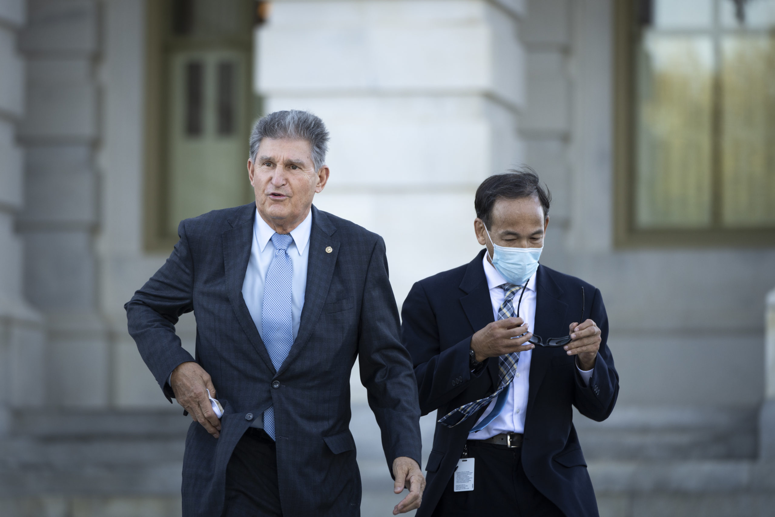 WASHINGTON, DC - OCTOBER 27: Sen. Joe Manchin (D-WV) leaves the U.S. Capitol after a vote October 27, 2021 in Washington, DC. Democrats are continuing internal negotiations about the Biden administration's social policy spending bill. (Photo by Drew Angerer/Getty Images)