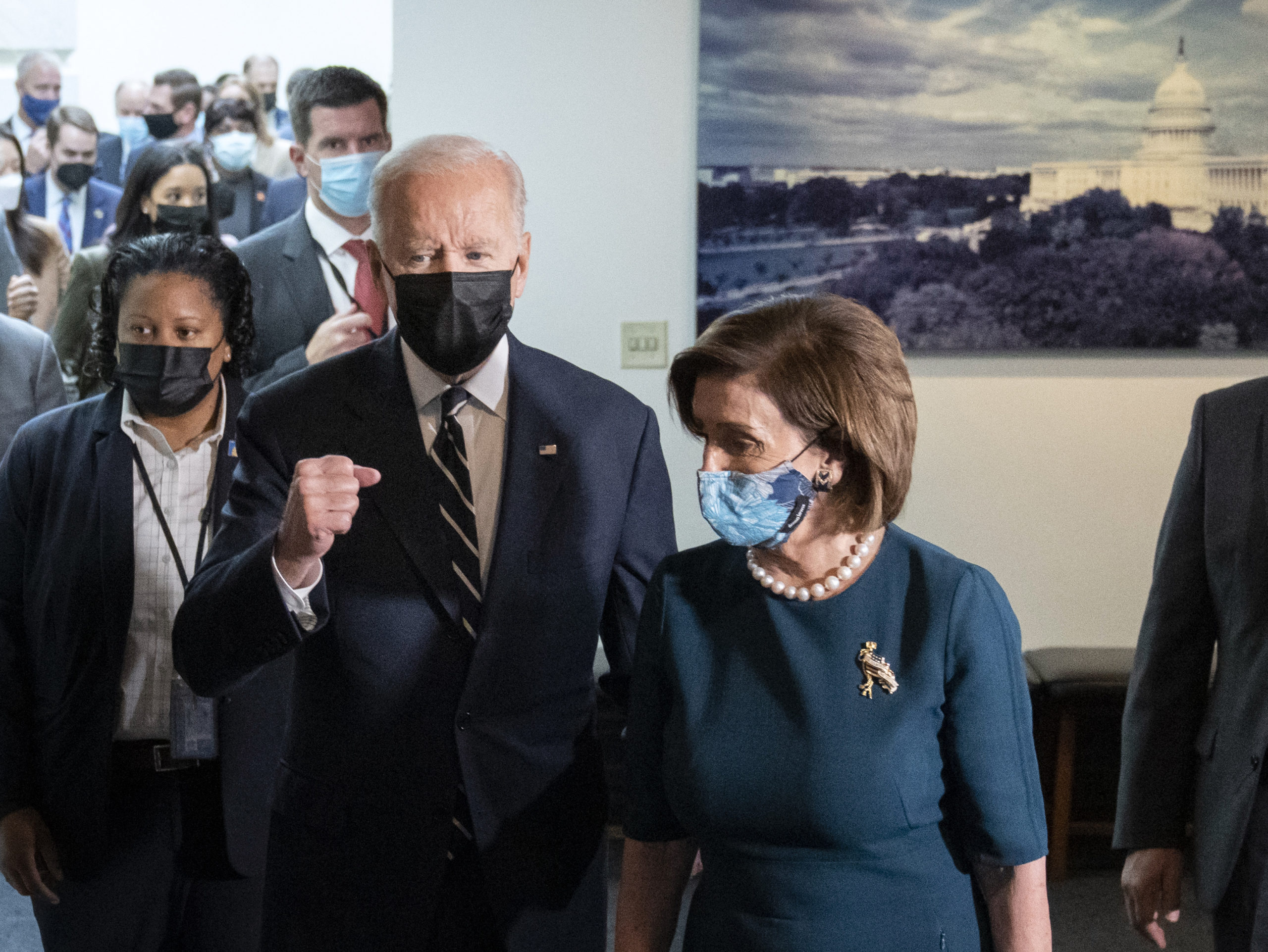President Joe Biden and House Speaker Nancy Pelosi leave a meeting with House Democrats at the Capitol Thursday. (Drew Angerer/Getty Images)