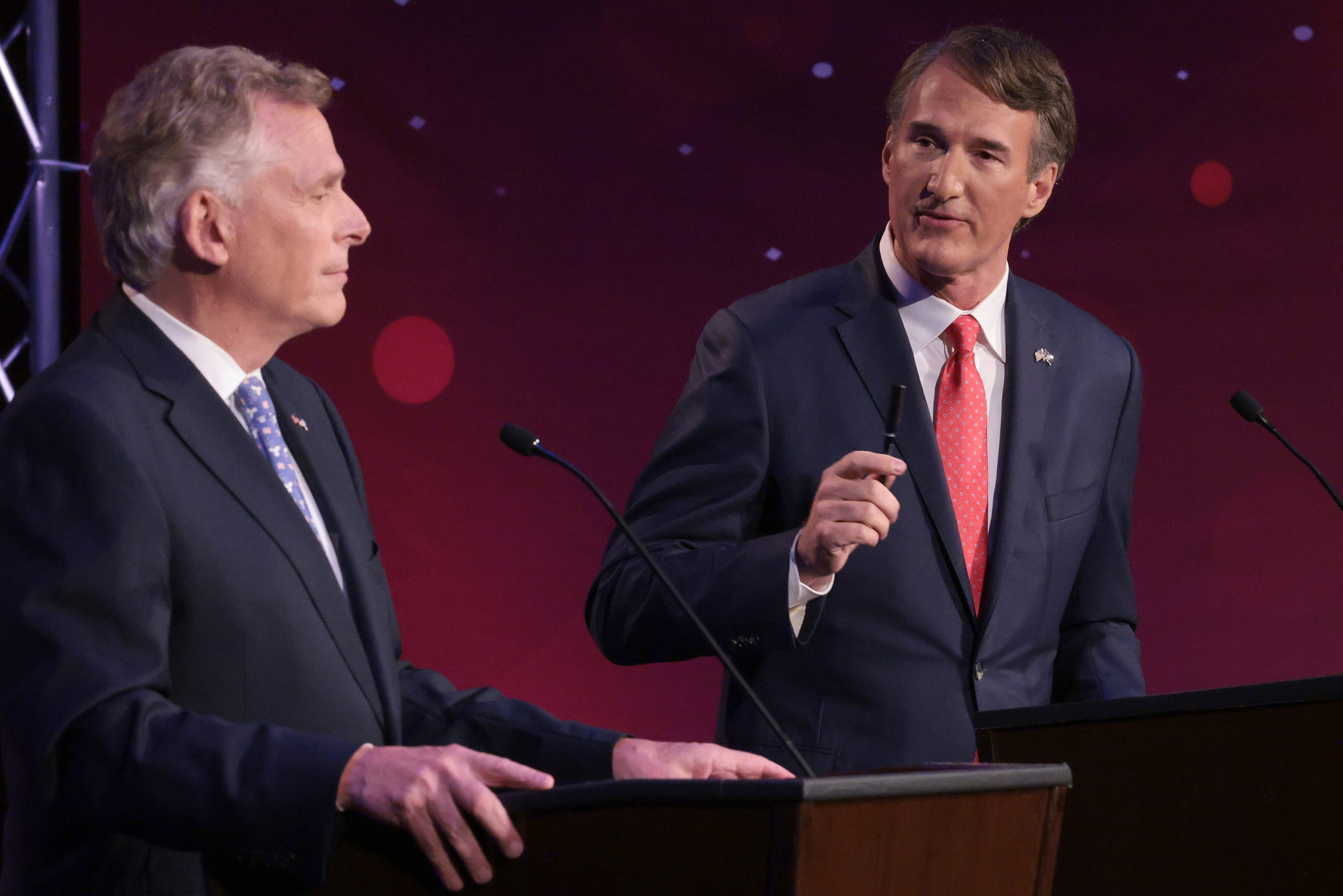 Former Virginia Gov. Terry McAuliffe and Republican gubernatorial candidate Glenn Youngkin debate in Alexandria, Virginia last month. The race has gotten steadily closer in its final weeks. (Win McNamee/Getty Images)