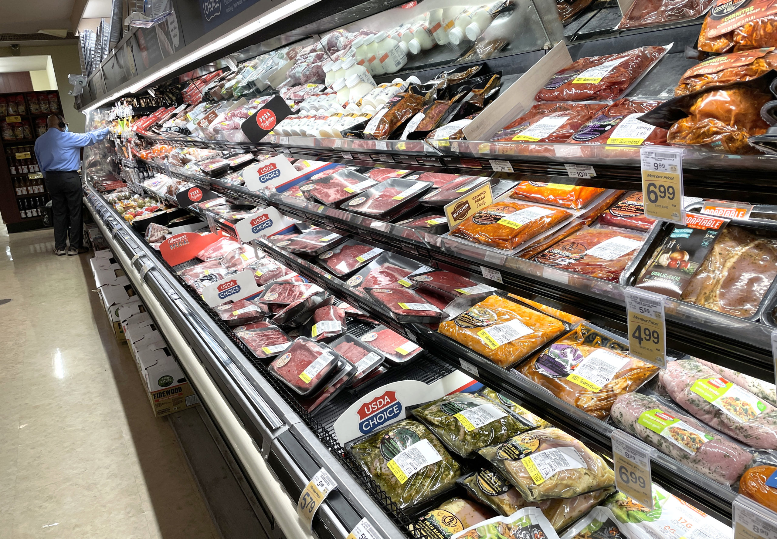 SAN FRANCISCO, CALIFORNIA - OCTOBER 04: A customer shops for meat at a Safeway store on October 04, 2021 in San Francisco, California. The price for meat at the grocery stores has surged over the past year with beef jumping 12.2%, pork 9.8% and chicken up 7.2% since last year. (Photo by Justin Sullivan/Getty Images)