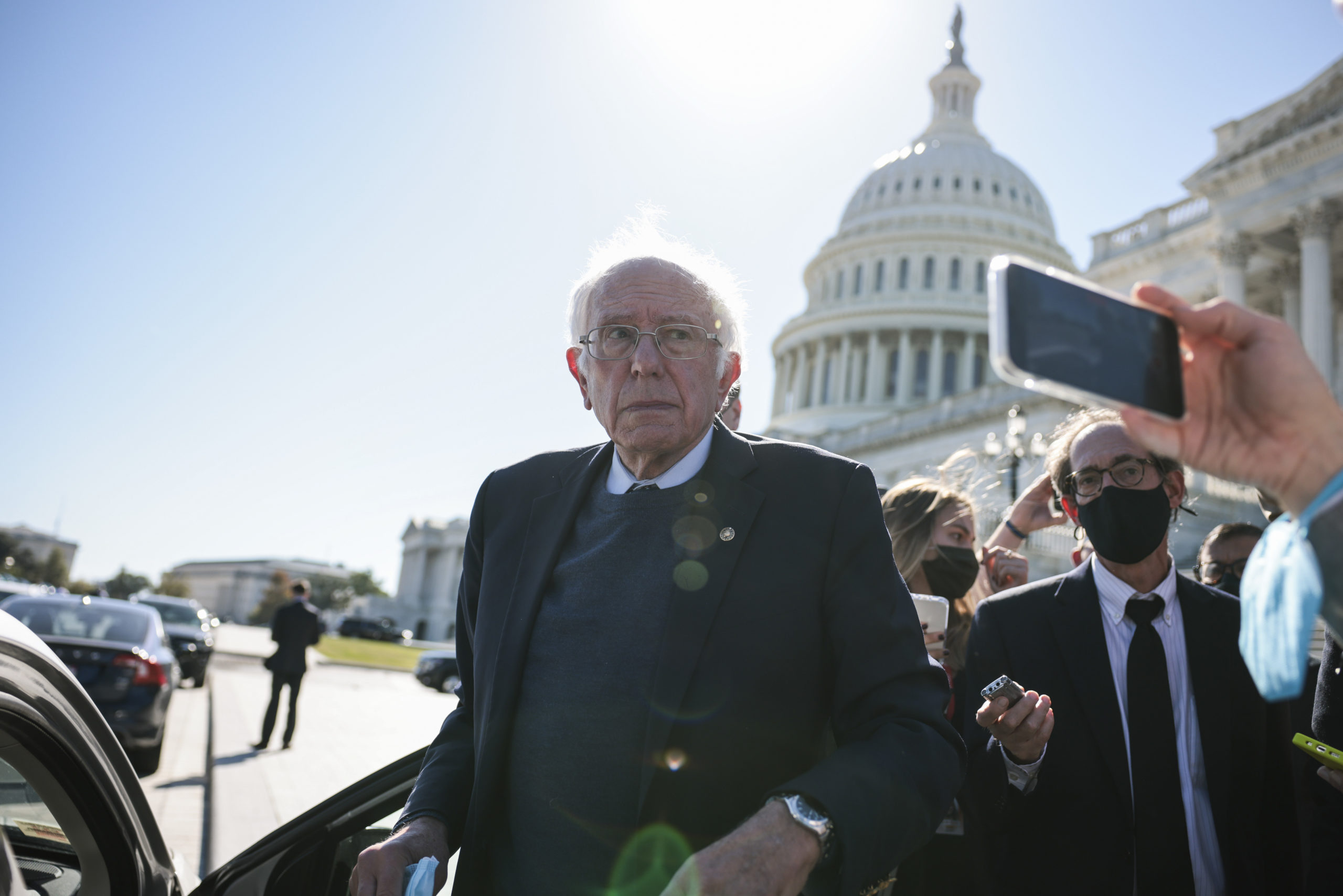 WASHINGTON, DC - OCTOBER 21: Sen. Bernie Sanders (I-VT) speaks with reporters as he leaves the U.S. Capitol Building following a vote on October 21, 2021 in Washington, DC. According to media reports the White House and Congress have trimmed the cost of President Biden's Build Back Better plan from $3.5 trillion to less than $2 trillion, as negotiations continue. (Photo by Anna Moneymaker/Getty Images)