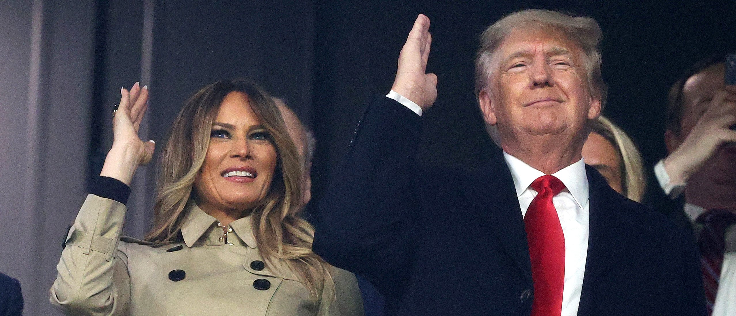 ATLANTA, GEORGIA - OCTOBER 30: Former first lady and president of the United States Melania and Donald Trump do "the chop" prior to Game Four of the World Series between the Houston Astros and the Atlanta Braves Truist Park on October 30, 2021 in Atlanta, Georgia. (Photo by Elsa/Getty Images)