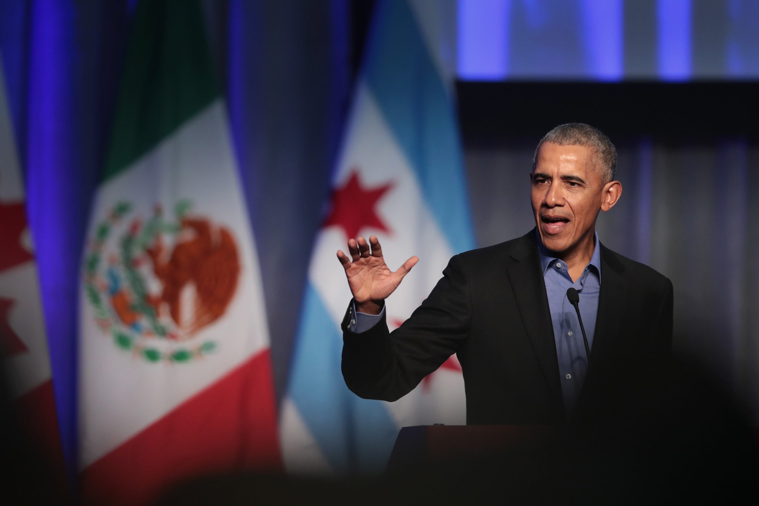 Former president Barack Obama speaks during a 2017 climate summit in Chicago. (Scott Olson/Getty Images)
