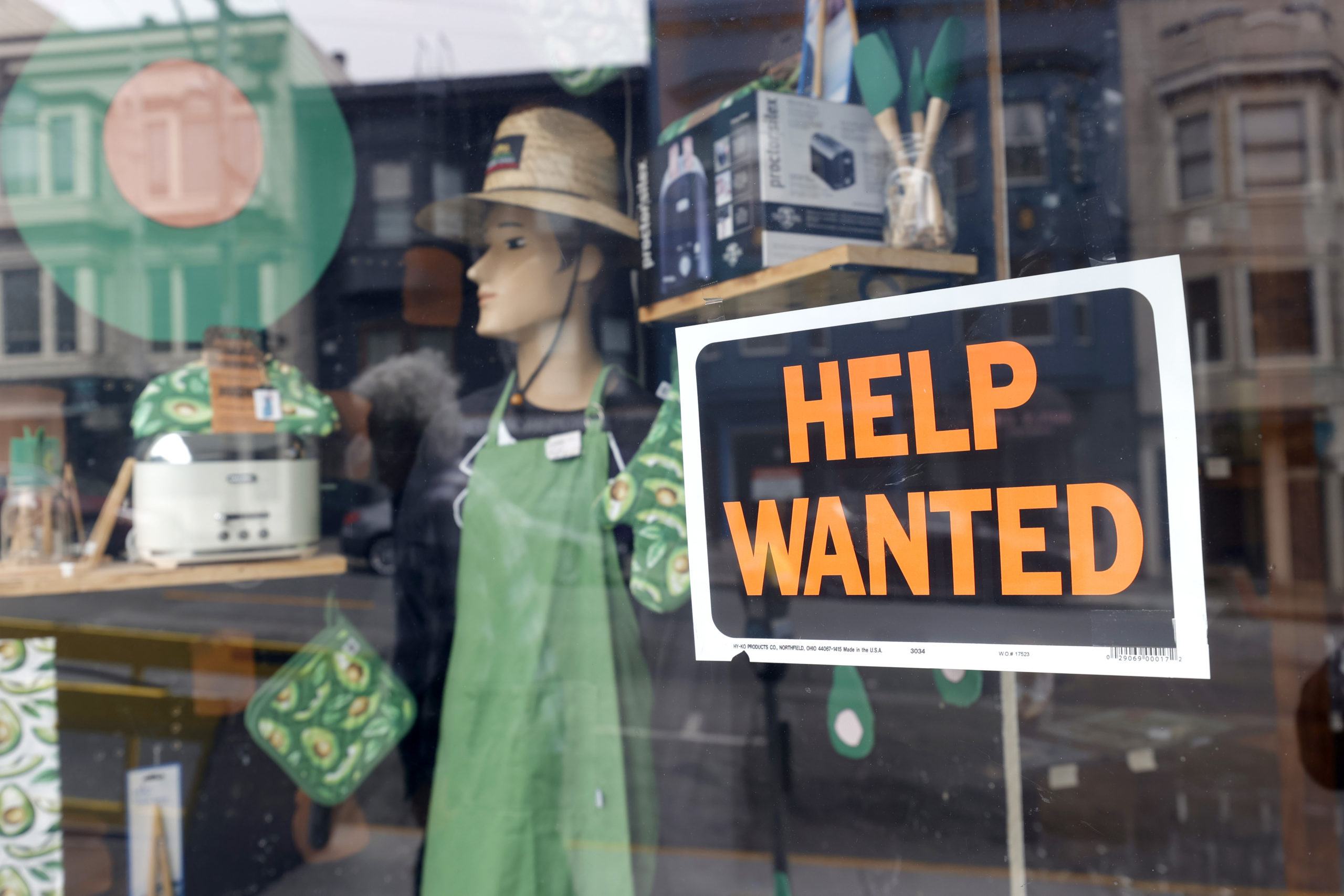 SAN FRANCISCO, CALIFORNIA - SEPTEMBER 16: A help wanted sign is posted in the window of hardware store on September 16, 2021 in San Francisco, California. Unemployment claims inched up to 332,000 from a pandemic low of 312,000 a week before. (Photo by Justin Sullivan/Getty Images)