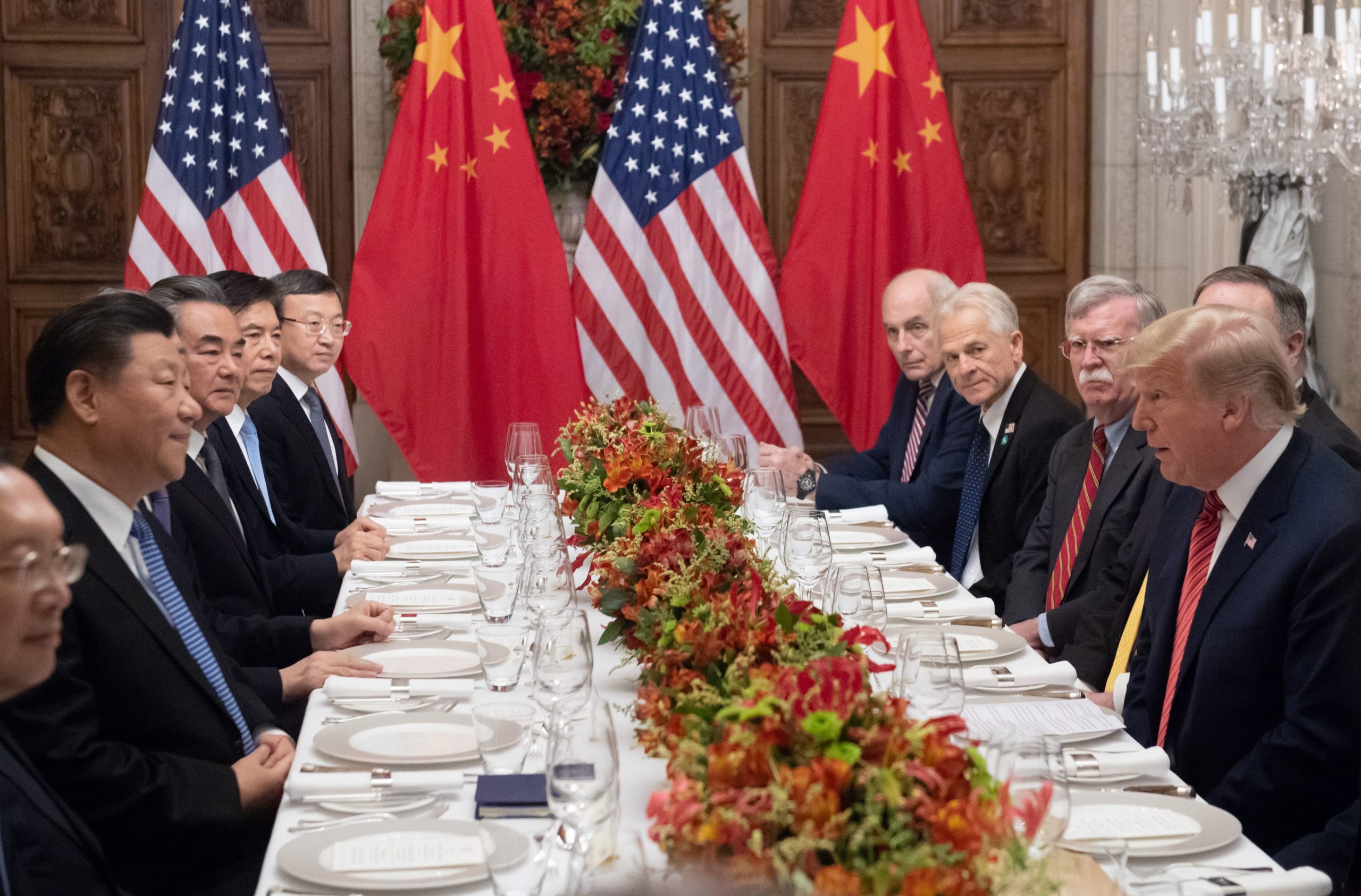 U.S. President Donald Trump and China's President Xi Jinping along with members of their delegations, hold a dinner meeting at the end of the G20 Leaders' Summit in Buenos Aires, on December 01, 2018. (Photo by SAUL LOEB/AFP via Getty Images)