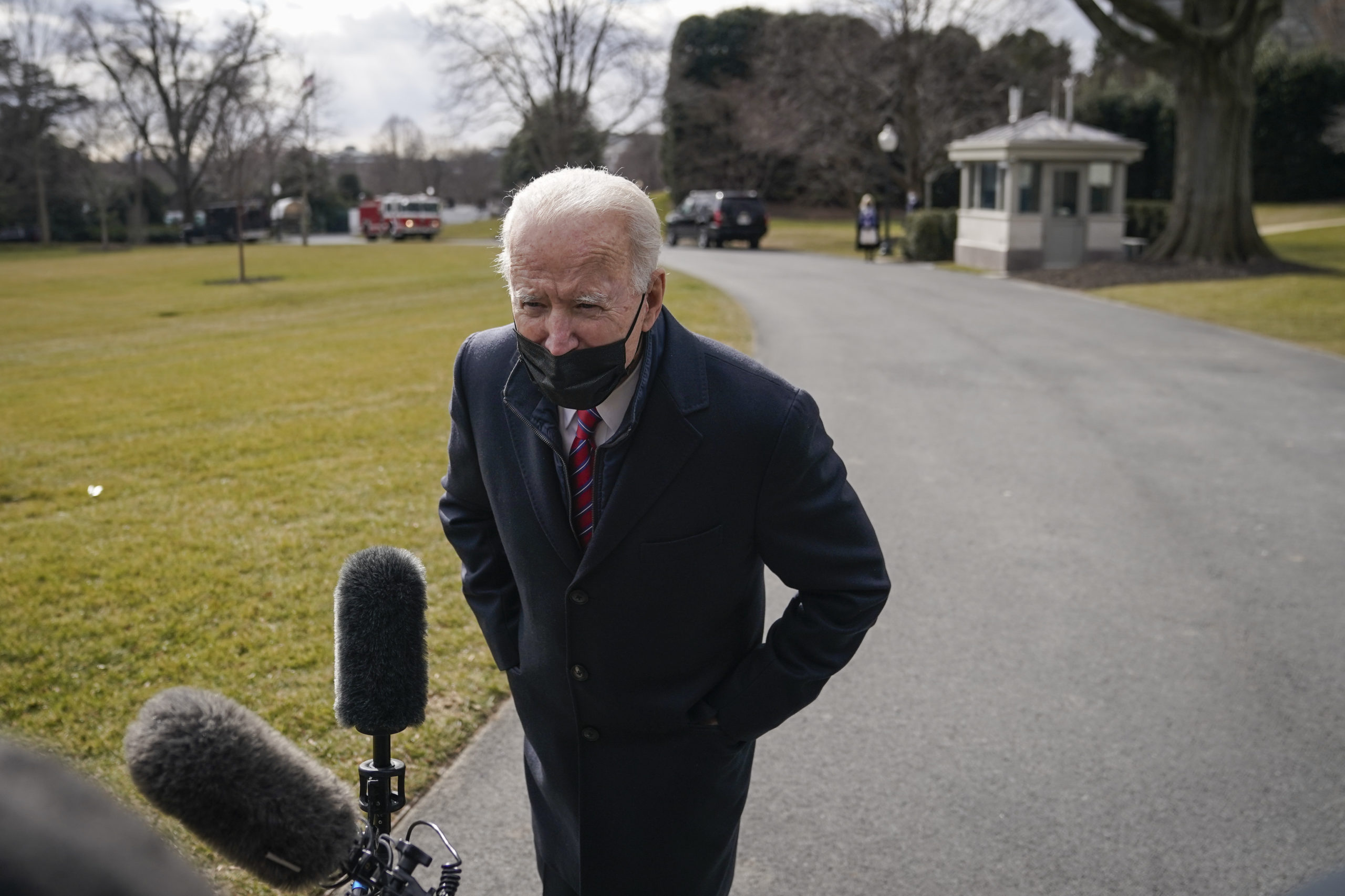 WASHINGTON, DC - JANUARY 29: U.S. President Joe Biden stops to briefly speak with reporters on his way to Marine One on the South Lawn of the White House on January 29, 2021 in Washington, DC. President Biden is traveling to Walter Reed National Military Medical Center to visit with wounded service members. (Photo by Drew Angerer/Getty Images)