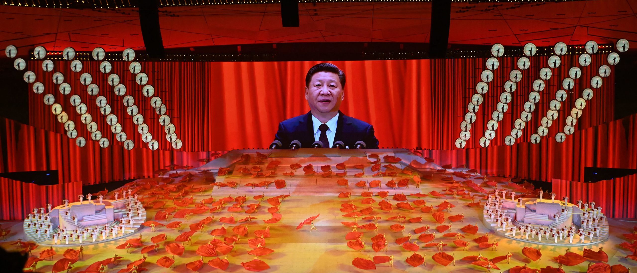 A picture of Chinese President Xi Jinping is seen on a large screen during a Cultural Performance as part of the celebration of the 100th Anniversary of the Founding of the Communist Party of China, at the Bird's nest national stadium in Beijing on June 28, 2021. (Photo by NOEL CELIS/AFP via Getty Images)
