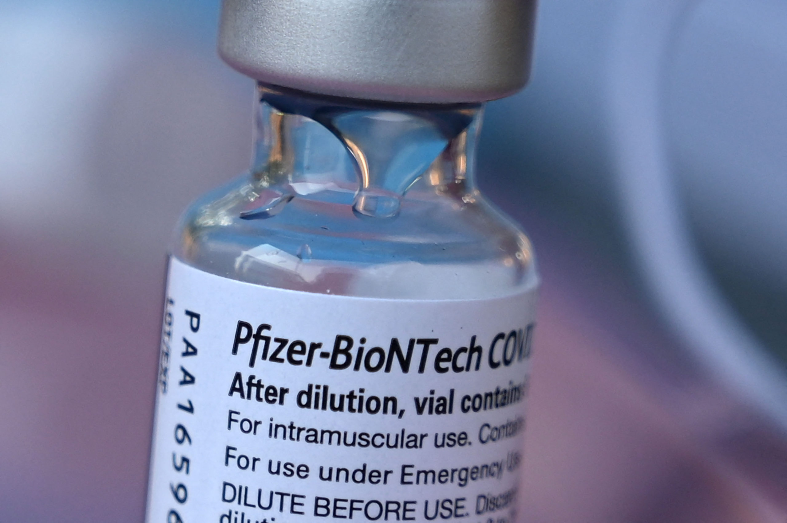 A vial of Pfizer-BioNTech Covid-19 vaccine is seen at a pop up vaccine clinic in the Arleta neighborhood of Los Angeles, California, August 23, 2021. - The US Food and Drug Administration on August 23, fully approved the Pfizer-BioNTech Covid shot, triggering a new wave of vaccine mandates as the Delta variant batters the country.