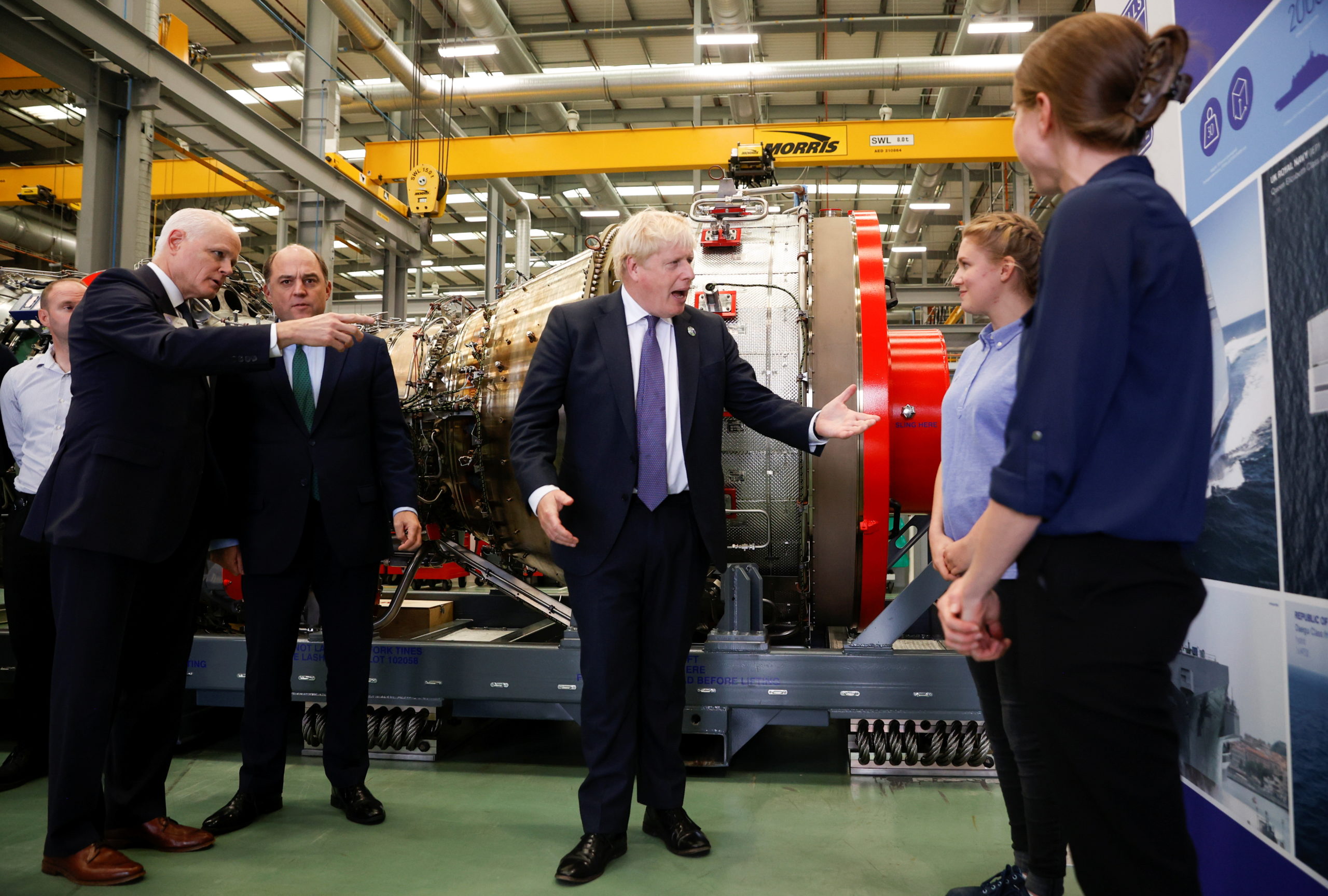 U.K. Prime Minister Boris Johnson visits a Rolls-Royce factory on Oct. 15 in Bristol, England. (John Sibley/WPA Pool/Getty Images)