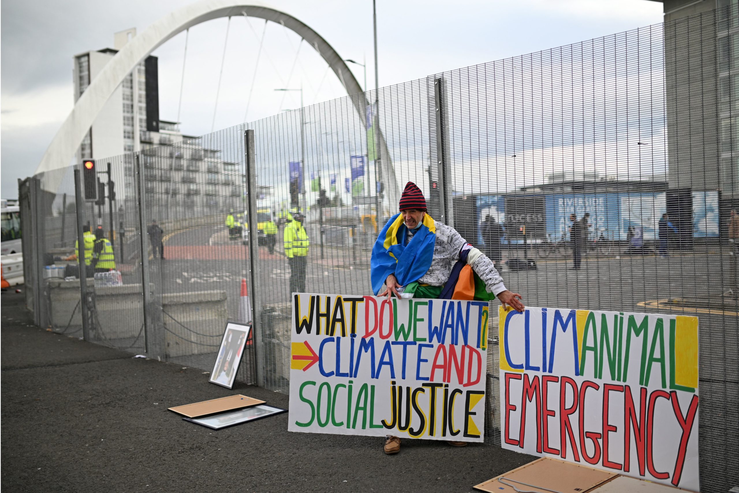 A French activist demonstrates outside COP26 in Glasgow, U.K. on Monday. (Oli Scarff/AFP via Getty Images)