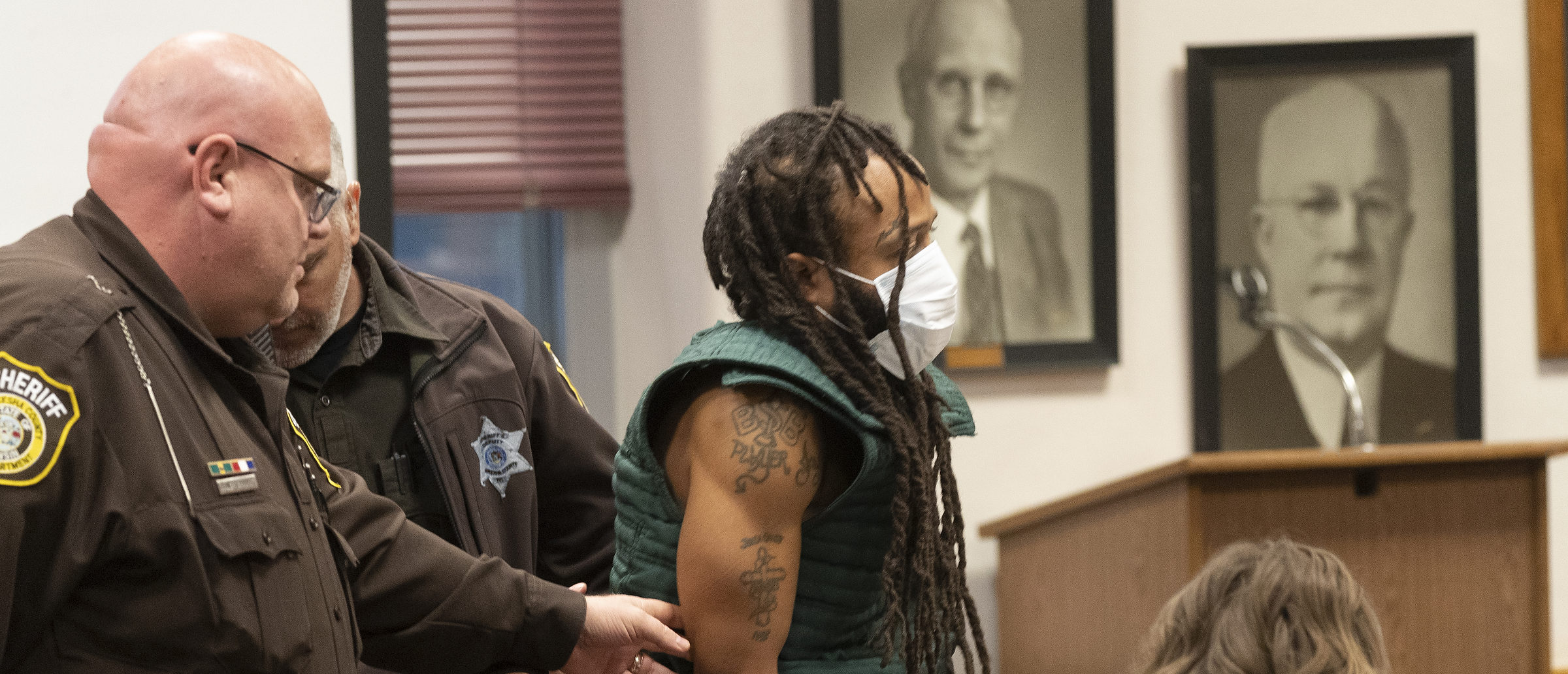 WAUKESHA, WISCONSIN - NOVEMBER 21: Darrell Brooks (C) appears at Waukesha County Court on November 23, 2021 in Waukesha, Wisconsin. Brooks is charged with killing five people and injuring nearly 50 after driving through a Christmas parade with his sport utility vehicle on November 21. (Photo by Mark Hoffman-Pool/Getty Images)