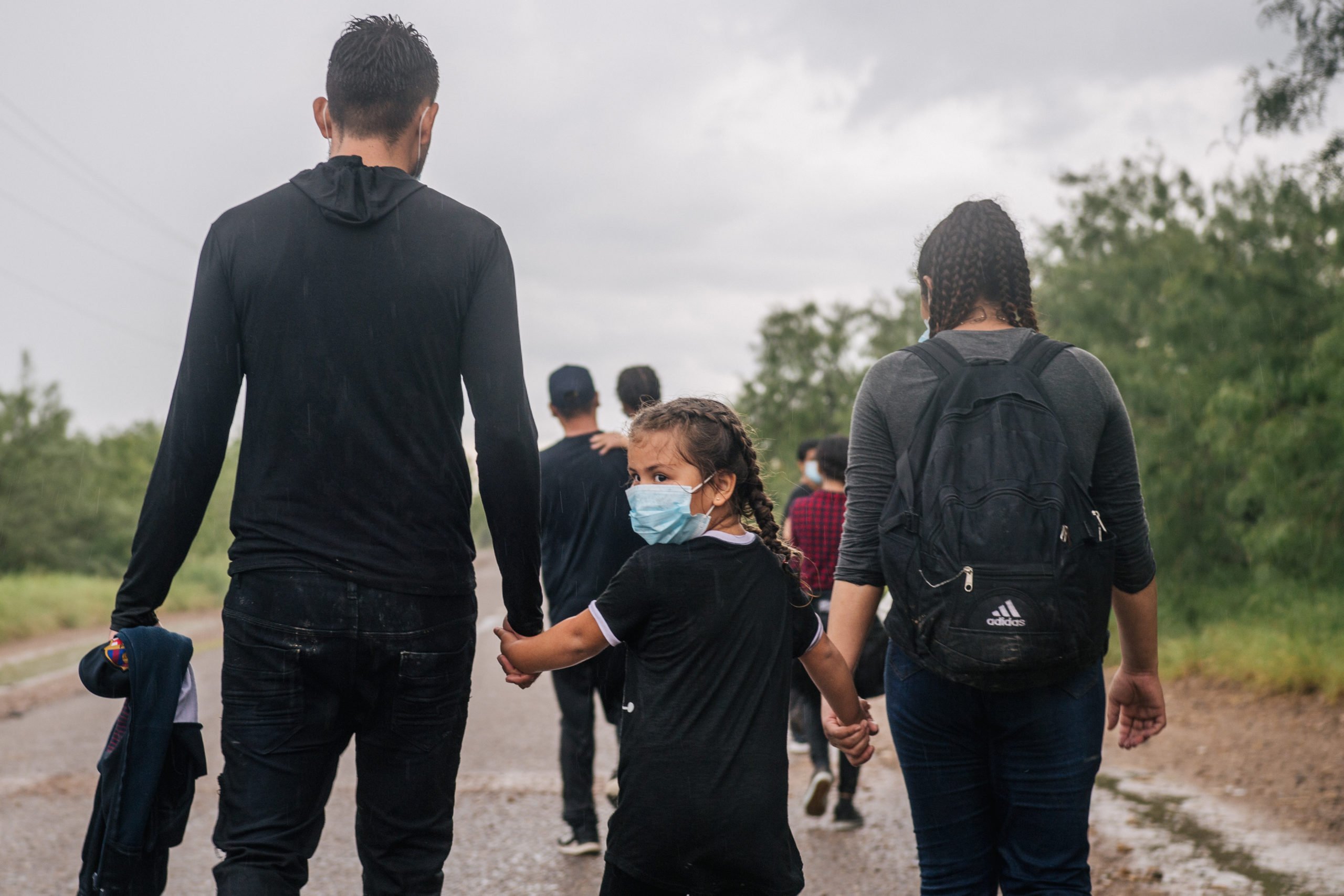 Immigrants seeking asylum crossed into the U.S. on June 16, 2021 in La Joya, Texas. (Photo by Brandon Bell/Getty Images)