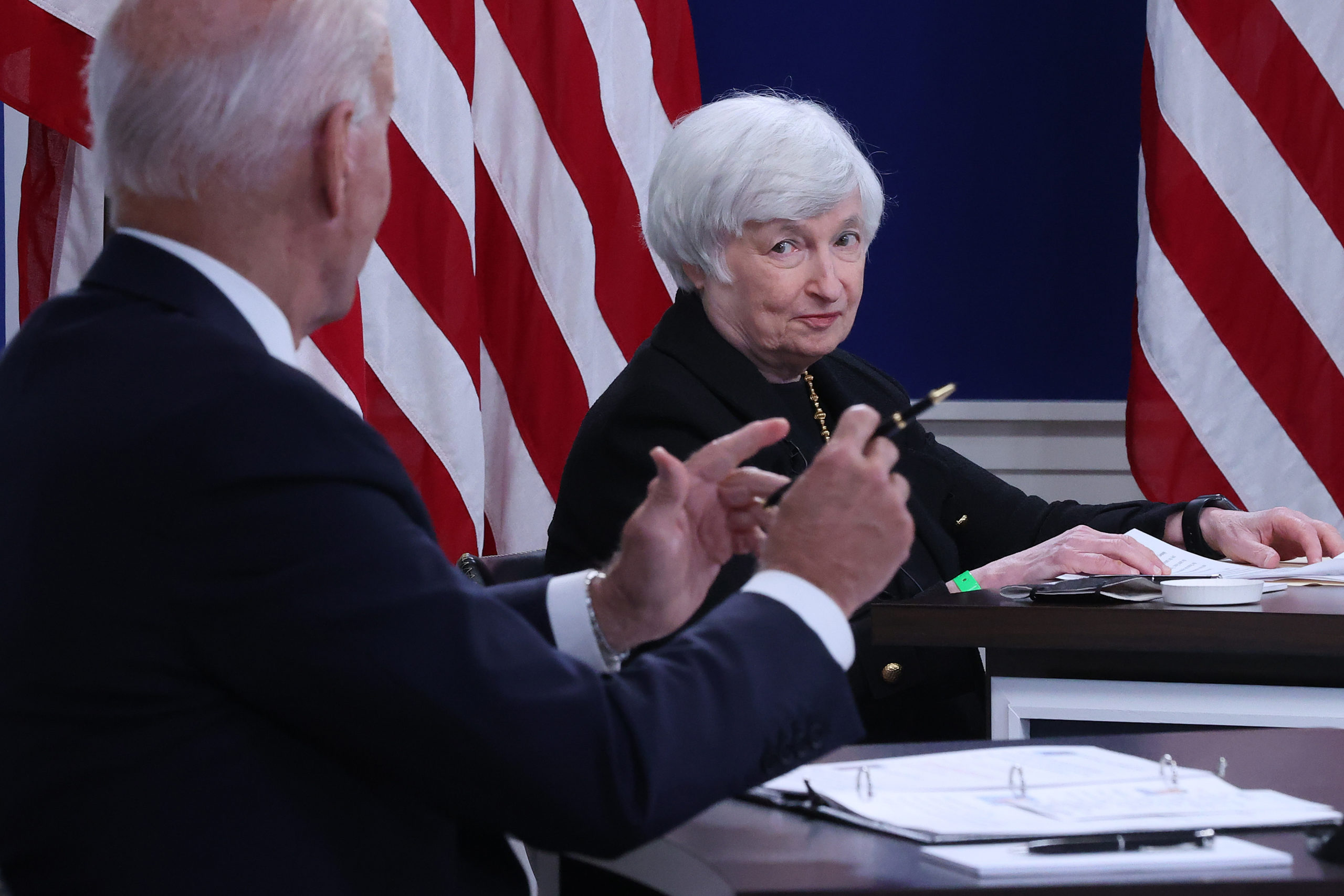 Treasury Secretary Janet Yellen listens to President Joe Biden during a meeting on climate change on Oct. 6. (Chip Somodevilla/Getty Images)