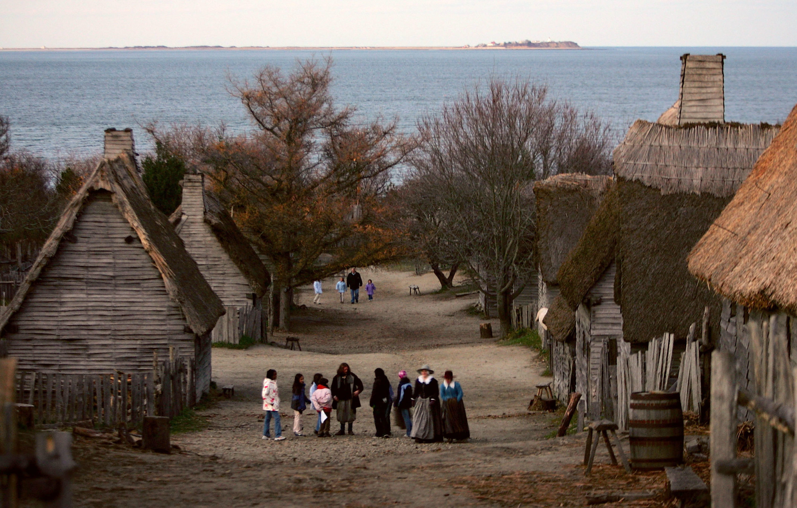 PLYMOUTH, MA - NOVEMBER 17: People visit the 1627 Pilgrim Village at "Plimoth Plantation" where role-players portray Pilgrims seven years after the arrival of the Mayflower November 17, 2005 in Plymouth, Massachusetts. The 17th century replica village was the site of the first Thanksgiving in 1623. Thanksgiving Day, believed to have originally taken place at the end of July, was established as a national holiday by U.S. President Abraham Lincoln in 1863 and is celebrated on the last Thursday of November. (Photo by Joe Raedle/Getty Images)