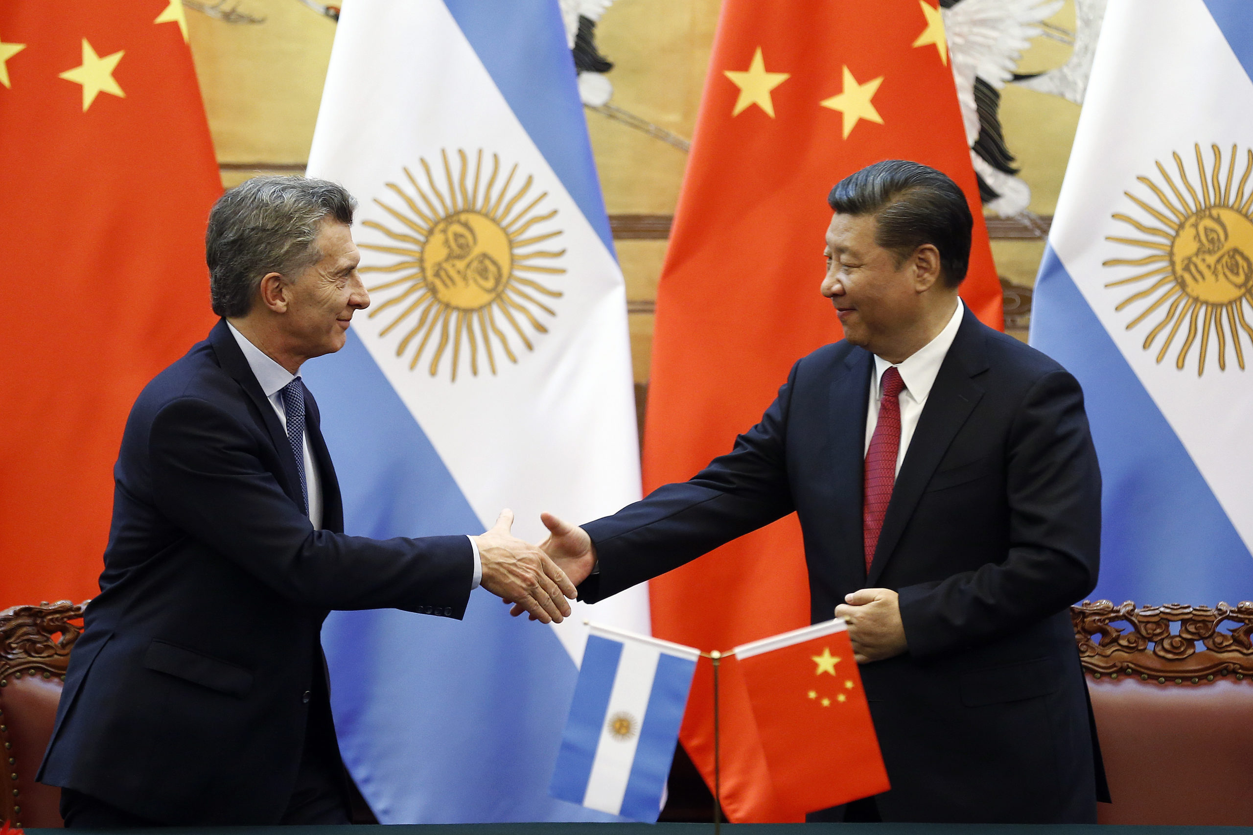 Chinese President Xi Jinping and Argentina's President Mauricio Macri attend a signing ceremony at the Great Hall of the People on May 17, 2017 in Beijing, China. (Photo by Damir Sagolj/Pool/Getty Images)
