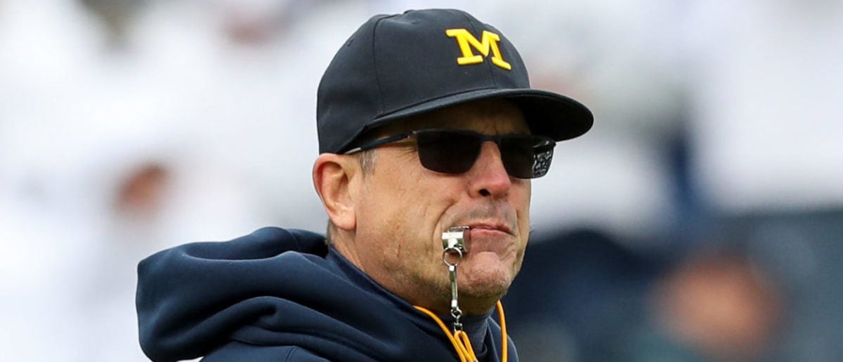 Michigan Wolverines' Jim Harbaugh interviewing with Minnesota Vikings